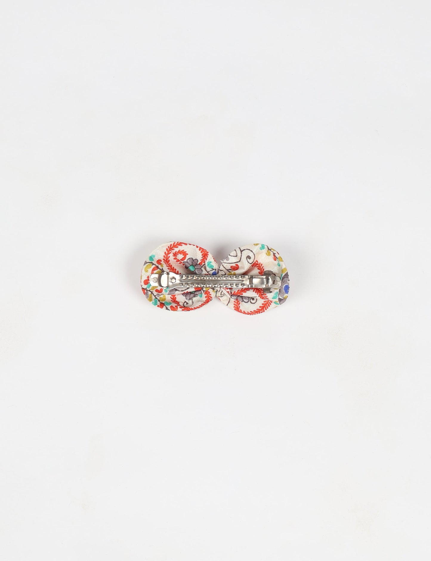 Stylish upcycled women's hairclip made from eco friendly products, reflecting the essence of upcycling fashion, ethical clothing, and sustainable apparel—ideal for those embracing slow fashion and earth friendly clothing.