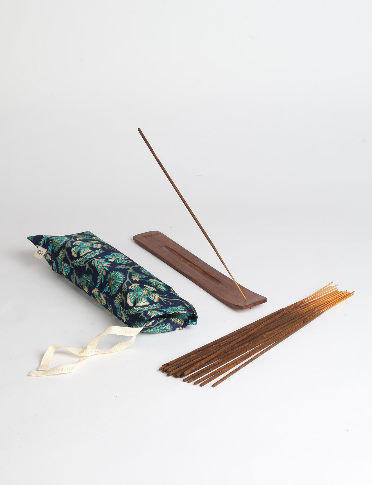 Incense stick set with wooden holder and repurposed sari fabric pouch, including 40 incense sticks.