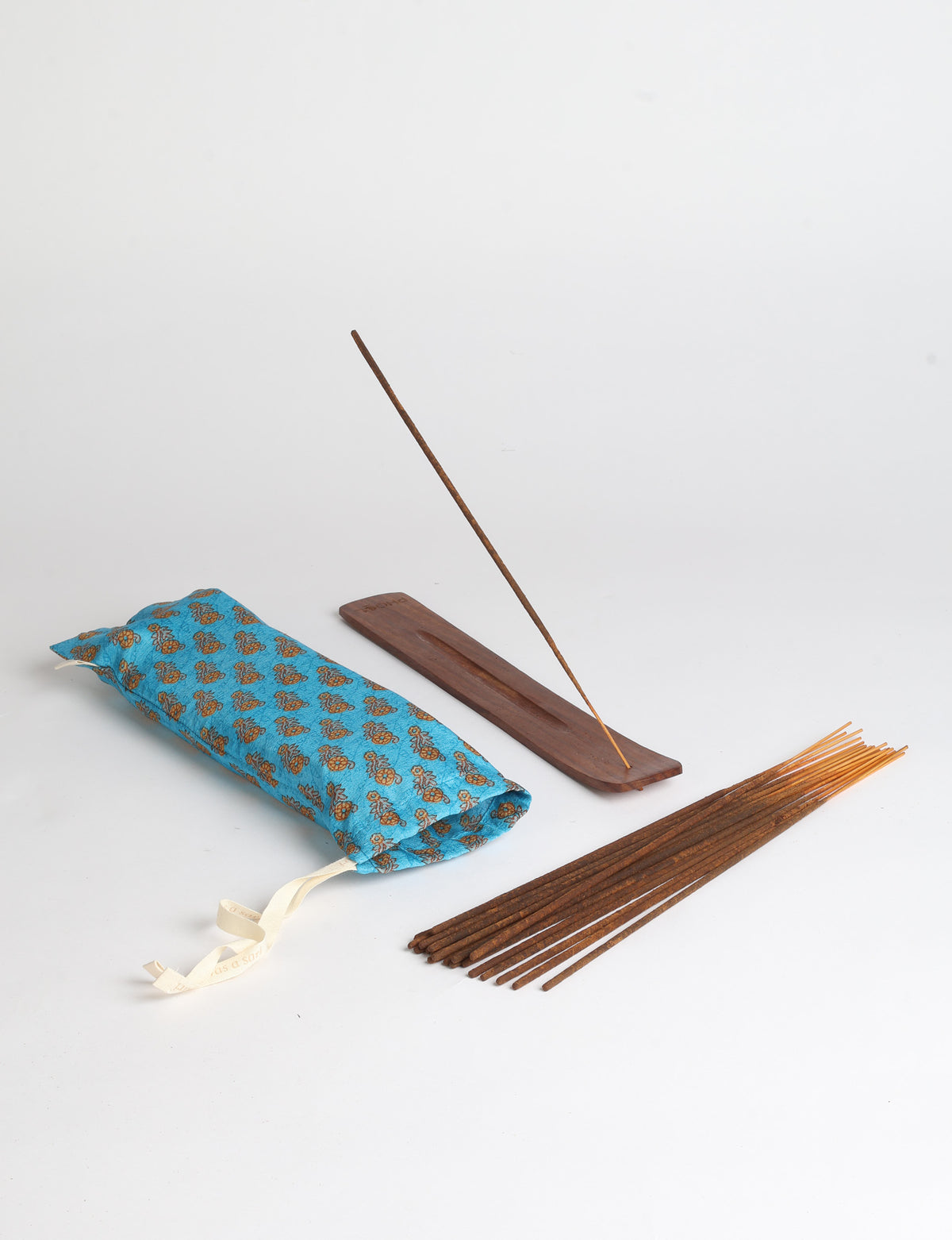 Incense stick set with wooden holder and repurposed sari fabric pouch, including 40 incense sticks.