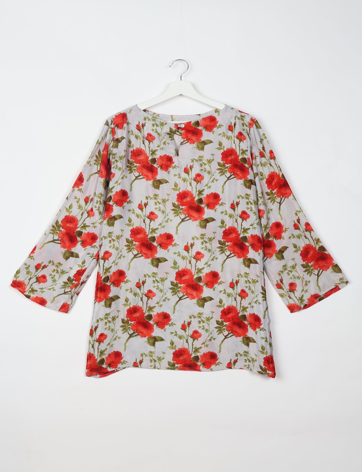 Chic and conscious, our A-line mini swing dress is a must-have in sustainable fashion. Adorned with flared sleeves, a keyhole back opening, and a mother of pearl button with twill tape loop. This zero waste, upcycled garment reflects the essence of eco-friendly and ethical clothing.