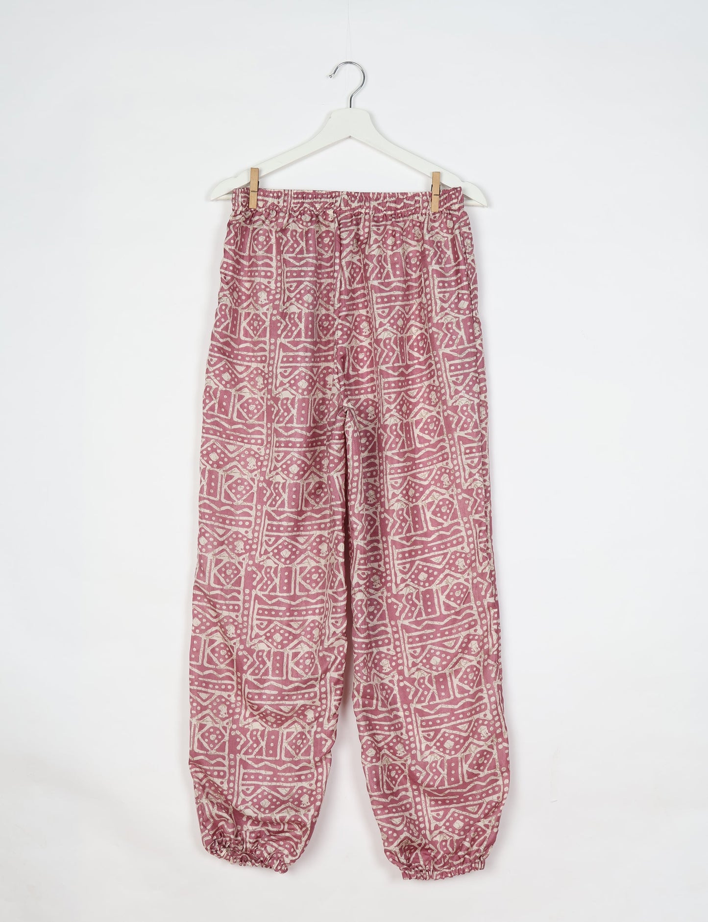 Comfortable and sustainable JOGGER PANTS, pull-on style crafted from eco-materials. Elastic drawstring waist, cotton twill tape, elasticated hems, and slant pockets for style and functionality. Make a positive impact on people and the planet with your fashion choices.