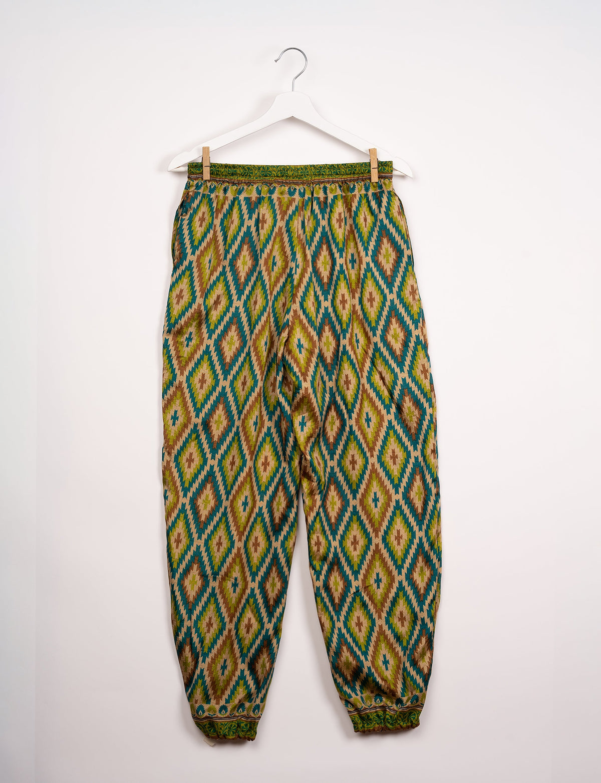 Comfortable and sustainable JOGGER PANTS, pull-on style crafted from eco-materials. Elastic drawstring waist, cotton twill tape, elasticated hems, and slant pockets for style and functionality. Make a positive impact on people and the planet with your fashion choices.