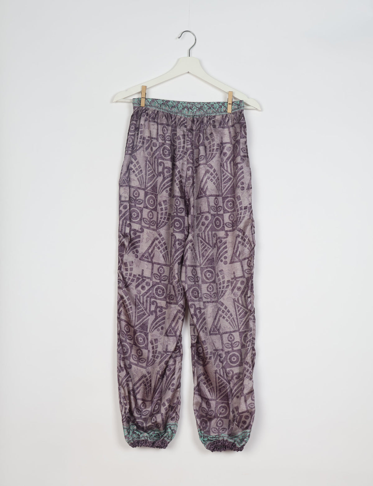 Comfortable and sustainable JOGGER PANTS, pull-on style crafted from eco-materials. Elastic drawstring waist, cotton twill tape, elasticated hems, and slant pockets for style and functionality. Make a positive impact on people and the planet with your fashion choices.