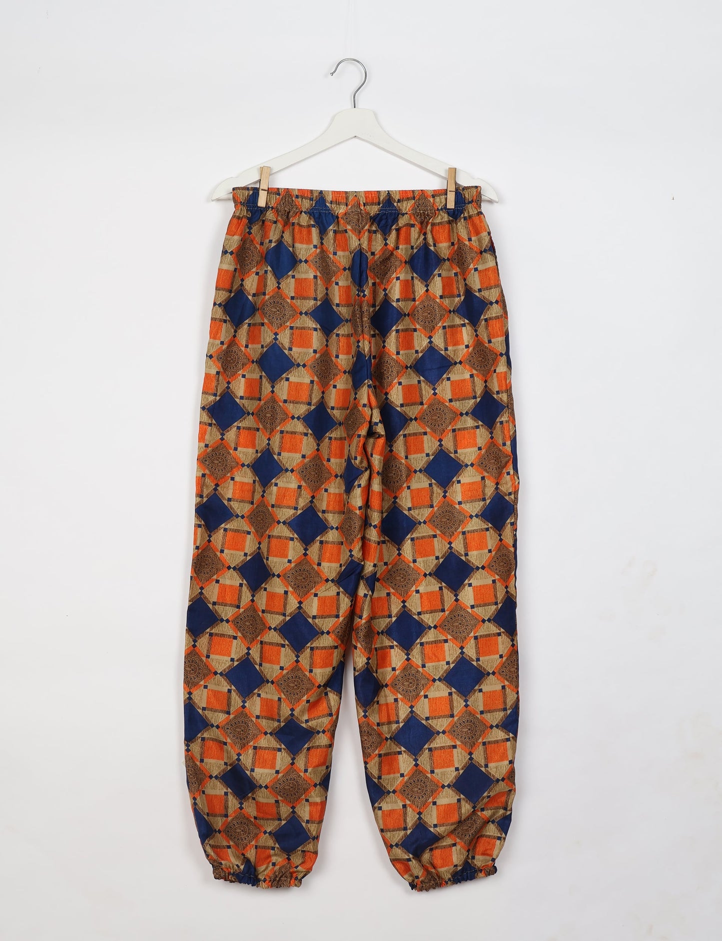 Comfortable and sustainable JOGGER PANTS, pull-on style crafted from eco-materials. Elastic drawstring waist, cotton twill tape, elasticated hems, and slant pockets for style and functionality. Make a positive impact on people and the planet with your fashion choices.