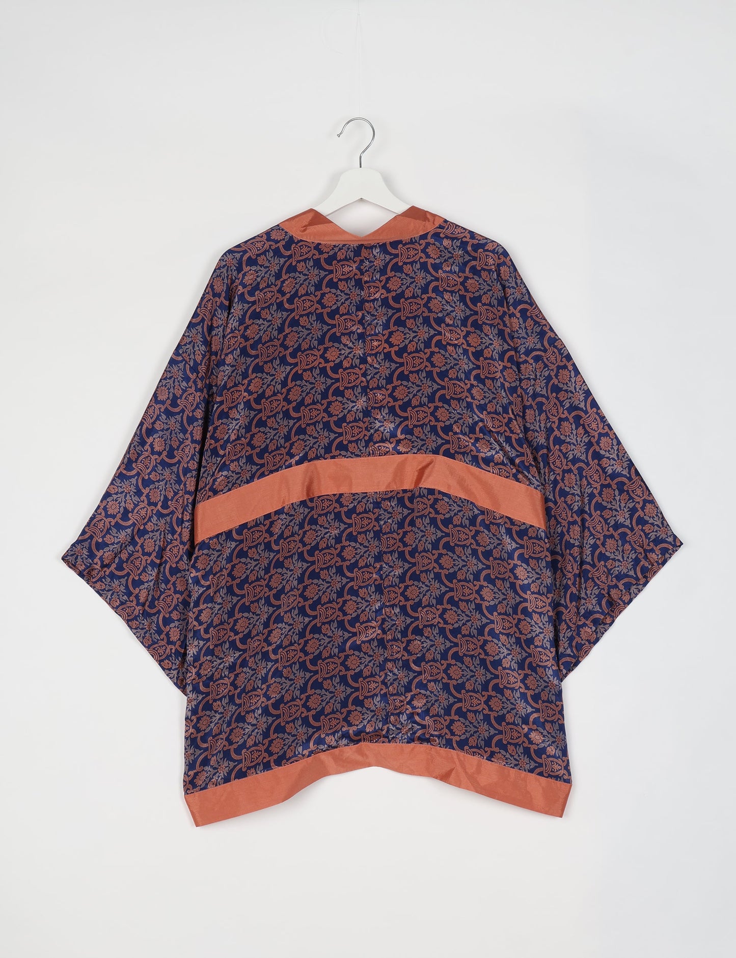 Chic and versatile KIMONO ROBE PRINT with a belt and loose straight-line sleeves. Throw it over swimwear, a t-shirt and shorts, leggings, or jeans for an instant style upgrade. Embrace fashionable versatility with this statement piece.