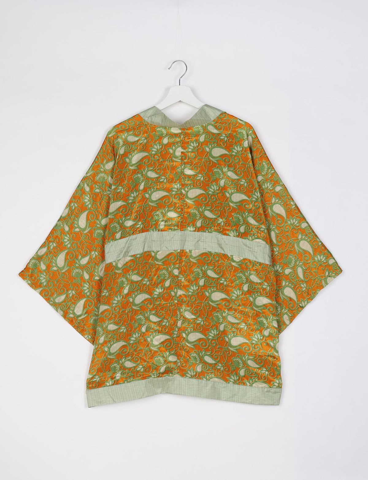 Chic and versatile KIMONO ROBE PRINT with a belt and loose straight-line sleeves. Throw it over swimwear, a t-shirt and shorts, leggings, or jeans for an instant style upgrade. Embrace fashionable versatility with this statement piece.