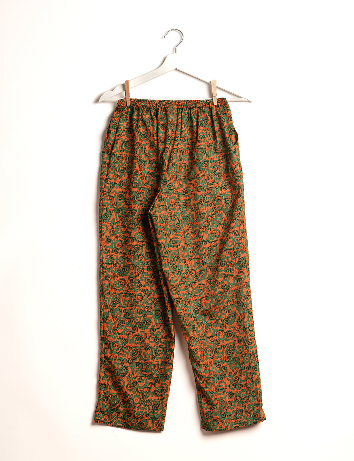 Elevate your wardrobe with our planet-friendly PULL-ON PANTS. Made from upcycled sari fabric, these eco-conscious pants offer a drawstring waist for a perfect fit. Tapered leg design ensures both style and comfort. Choose ethical, green fashion that supports artisans and sustainable living.