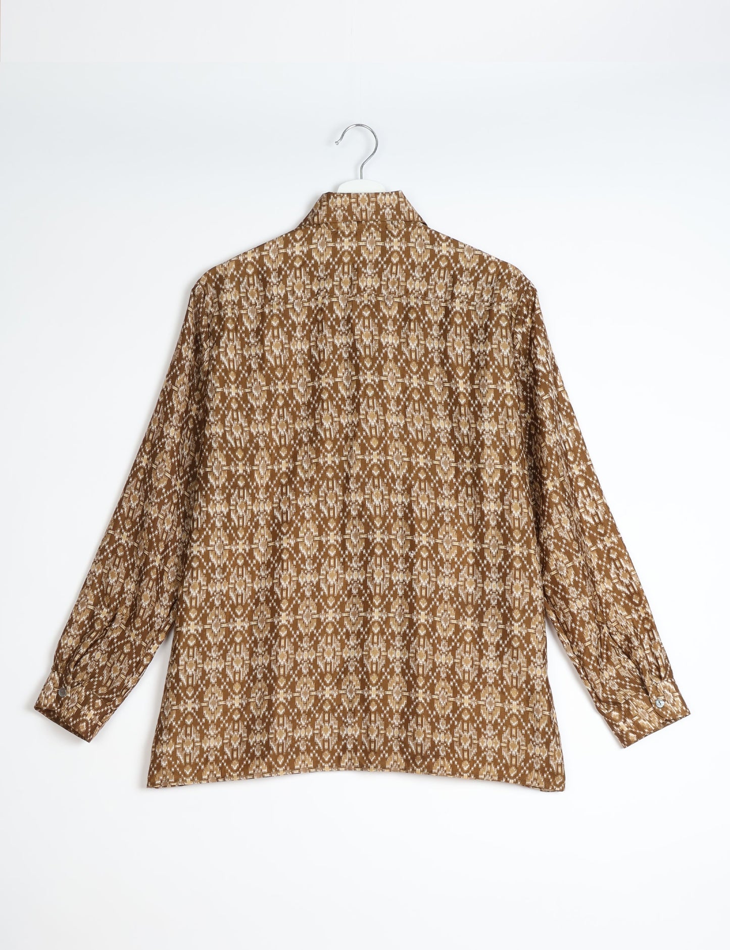 A person wearing a Resort Shirt, a sustainable fashion choice made from recycled materials.