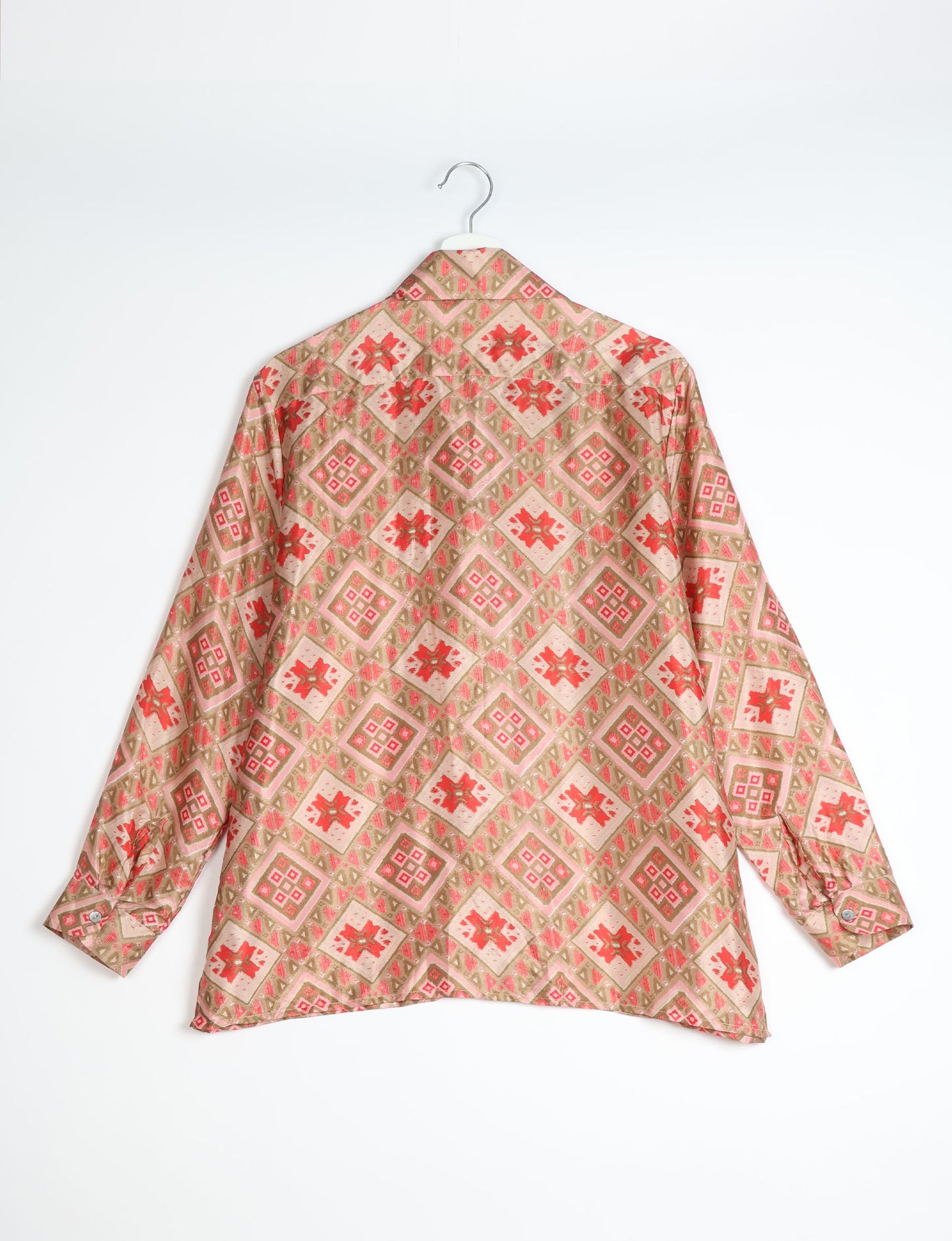 A person wearing a Resort Shirt, a sustainable fashion choice made from recycled materials.