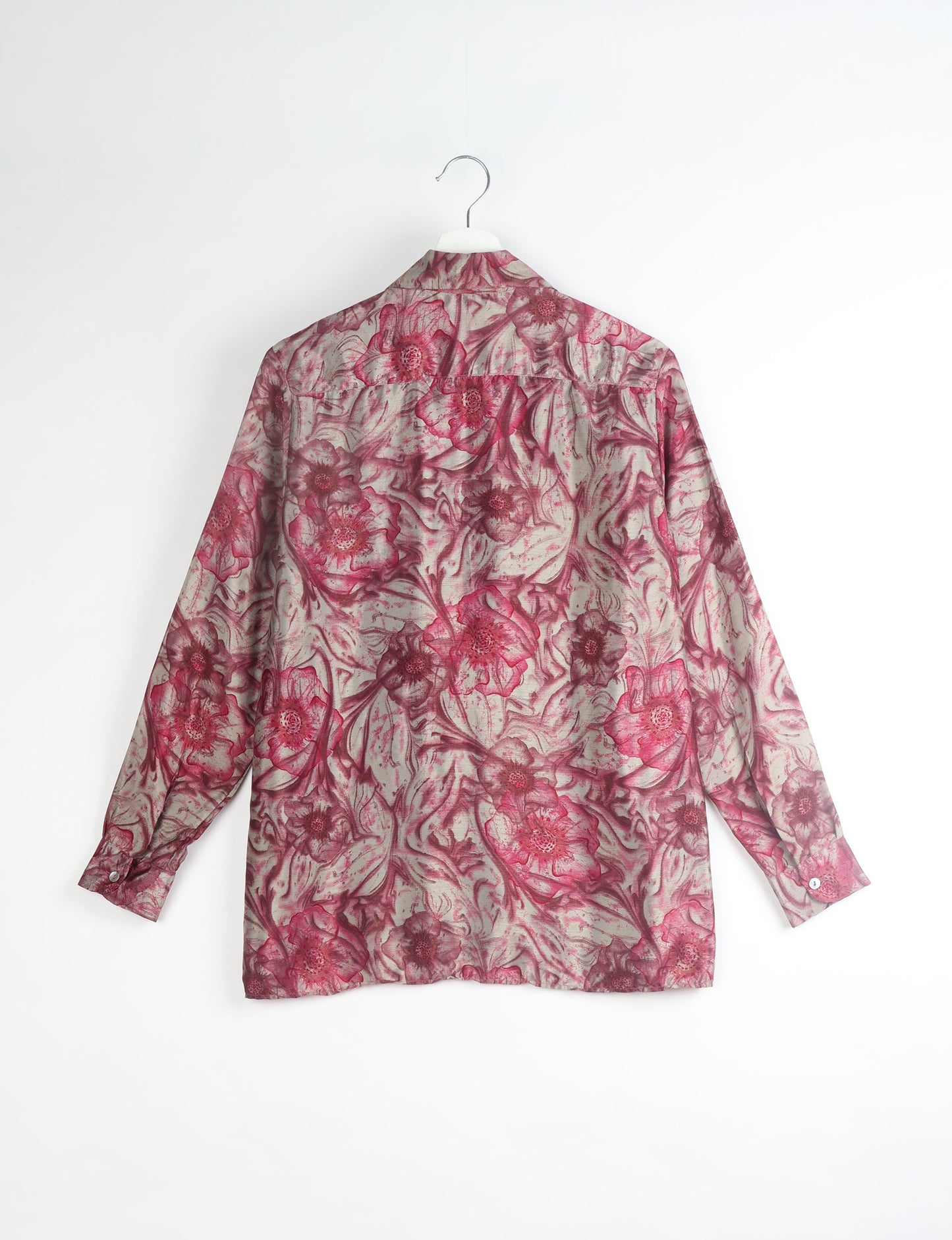 A person wearing a Resort Shirt, a sustainable fashion choice made from recycled materials.