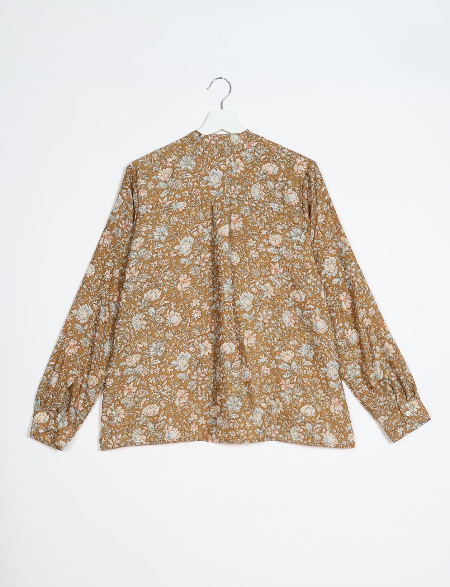 Versatile DAY BLOUSE, a sustainable wardrobe essential with a classic Johnny collar and full sleeves. Lightweight fabric for a comfortable fit, perfect for dressing up or down. Explore ethical clothing and green fashion with this eco-friendly and timeless piece, perfect for any occasion.