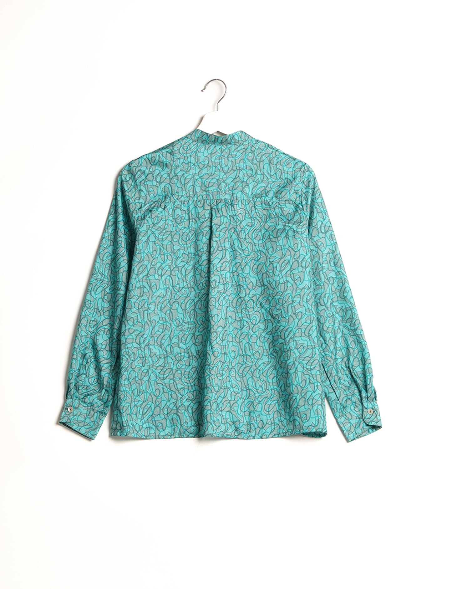 Versatile DAY BLOUSE, a sustainable wardrobe essential with a classic Johnny collar and full sleeves. Lightweight fabric for a comfortable fit, perfect for dressing up or down. Explore ethical clothing and green fashion with this eco-friendly and timeless piece, perfect for any occasion.