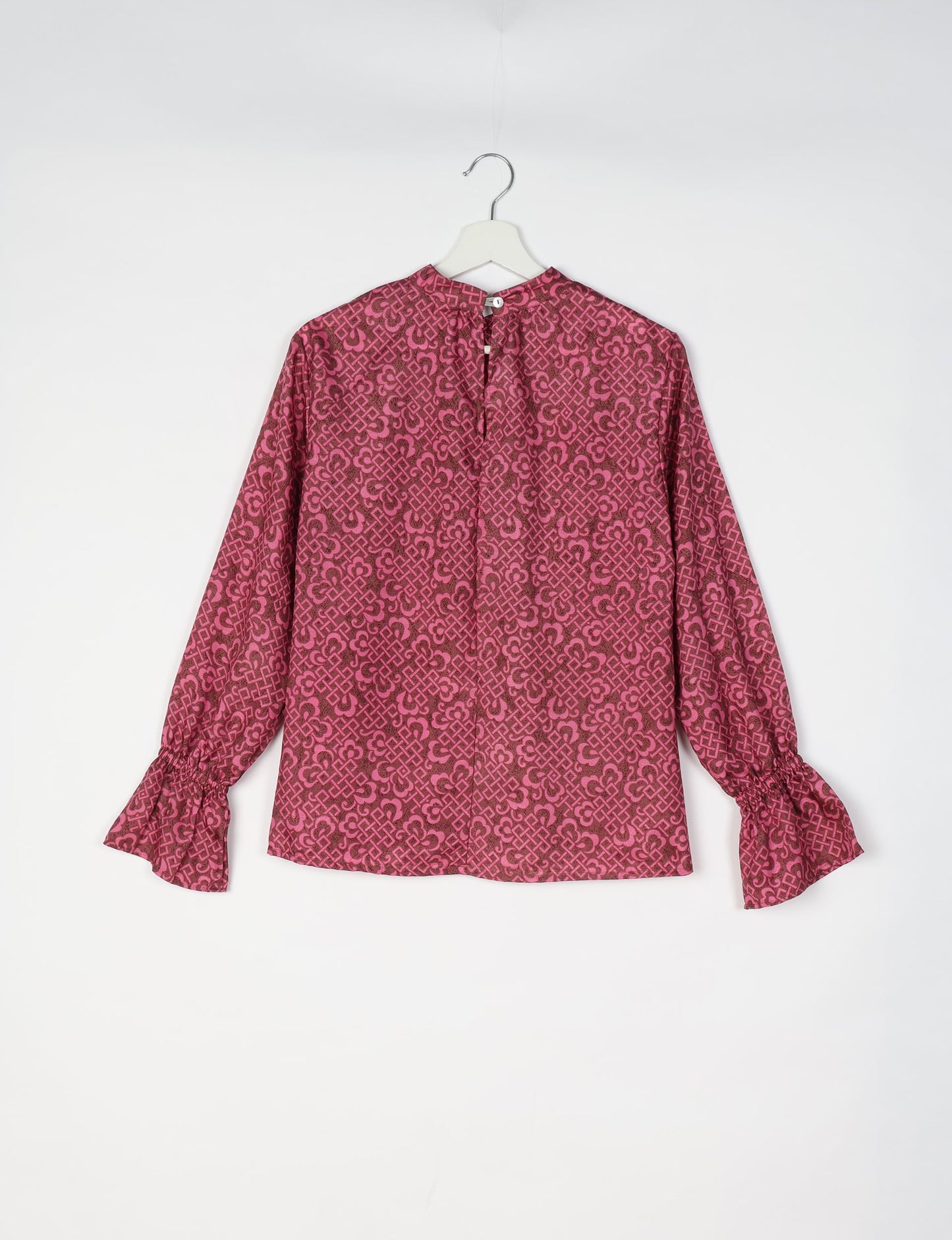 Flowing blouse with peasant sleeves and gathered neckline made from upcycled garments and repurposed clothing, showcasing eco clothing and fair trade fashion in a stylish, comfortable design.