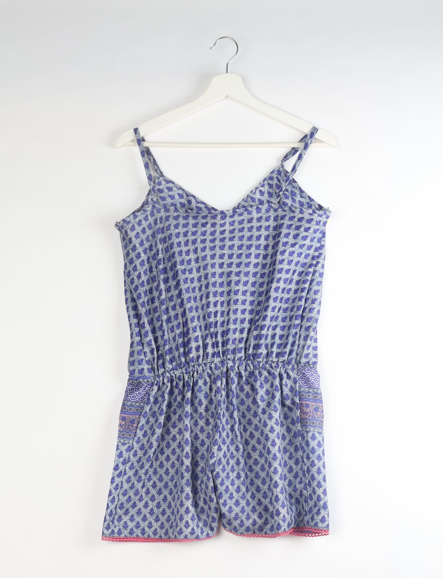 Vibrant playsuit with lace accents, crafted from upcycled saris. Embrace ethical fashion with this unique piece designed for conscious consumers.