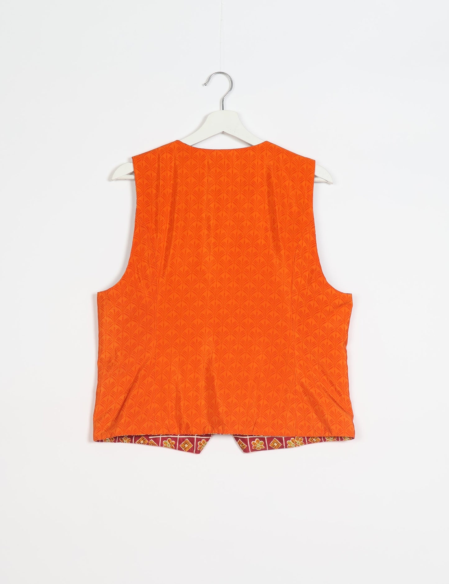 Day Waistcoat made from repurposed saris with macramé-covered buttons, showcasing eco clothing and recycled sari fashion for an eco-friendly, upcycled women's garment.