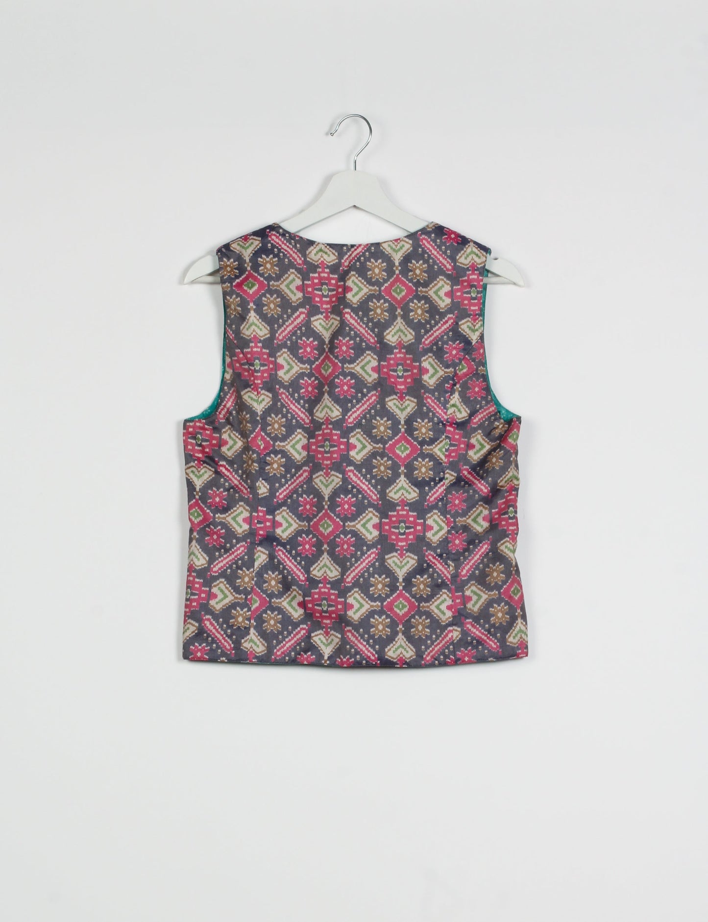 Day Waistcoat made from repurposed saris with macramé-covered buttons, showcasing eco clothing and recycled sari fashion for an eco-friendly, upcycled women's garment.
