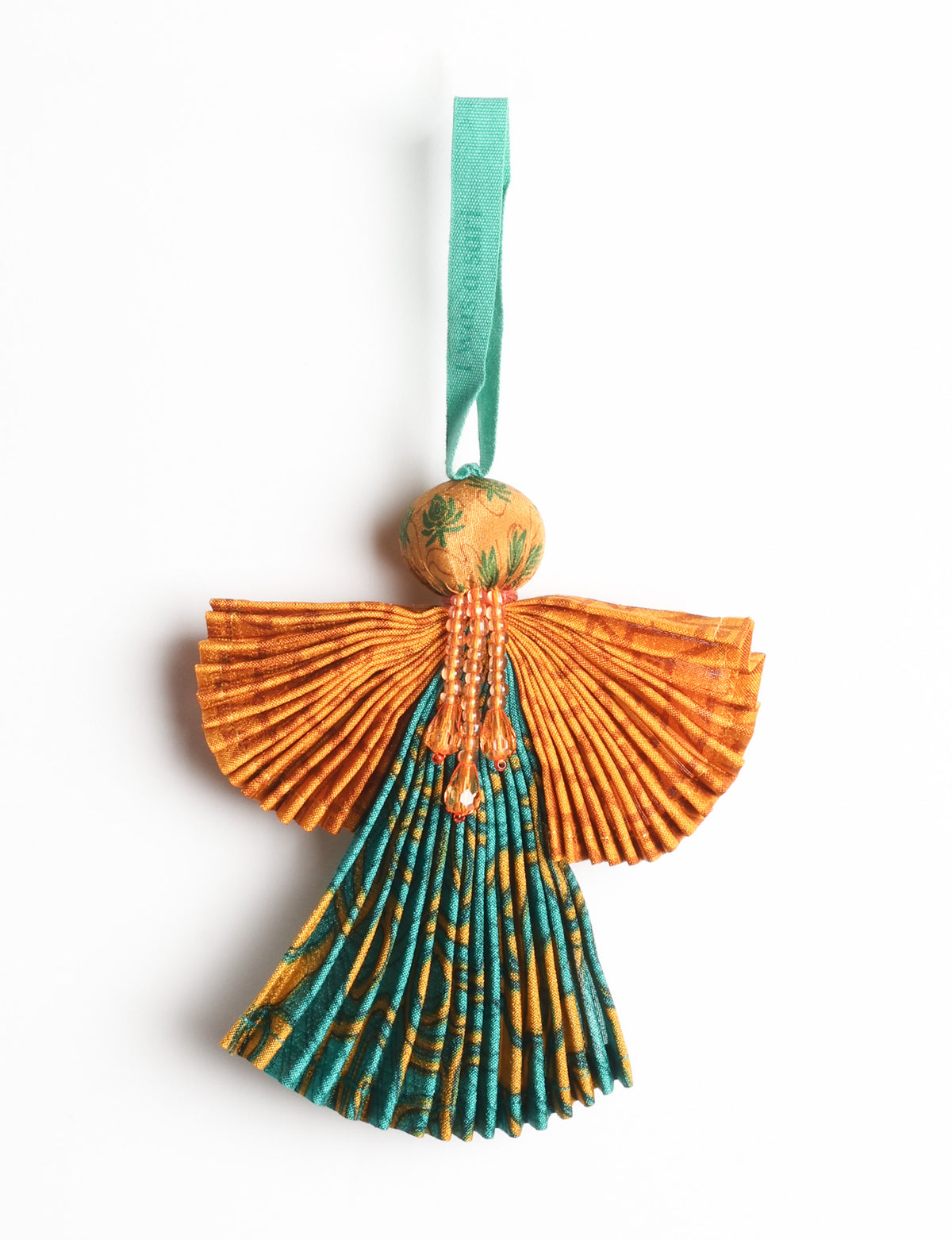 Angel Christmas Ornament made from upcycled saris, featuring pleated arms and body. A sustainable, eco-friendly holiday decoration, embodying recycled fashion and upcycling in festive style.