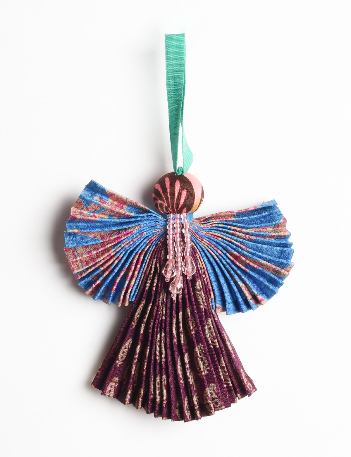 Angel Christmas Ornament made from upcycled saris, featuring pleated arms and body. A sustainable, eco-friendly holiday decoration, embodying recycled fashion and upcycling in festive style.