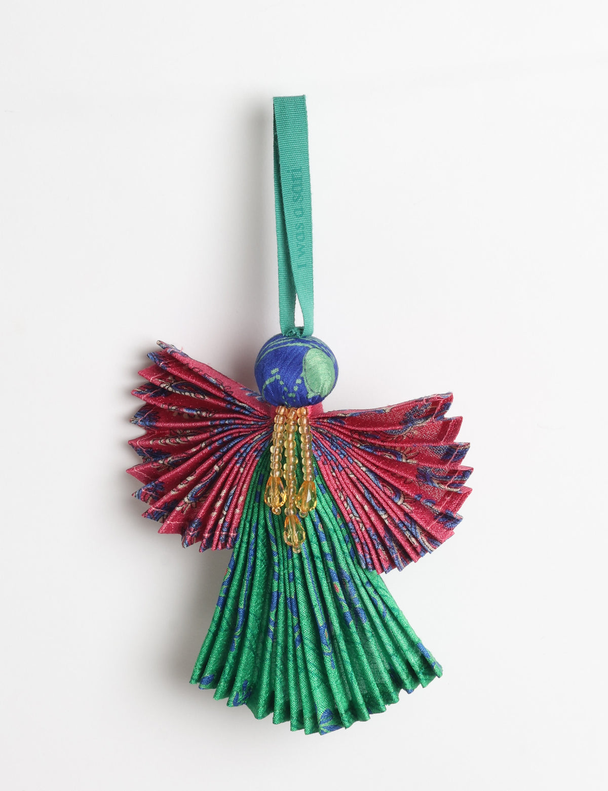 Angel Christmas Ornament made from upcycled saris, featuring pleated arms and body. A sustainable, eco-friendly holiday decoration, embodying recycled fashion and upcycling in festive style.