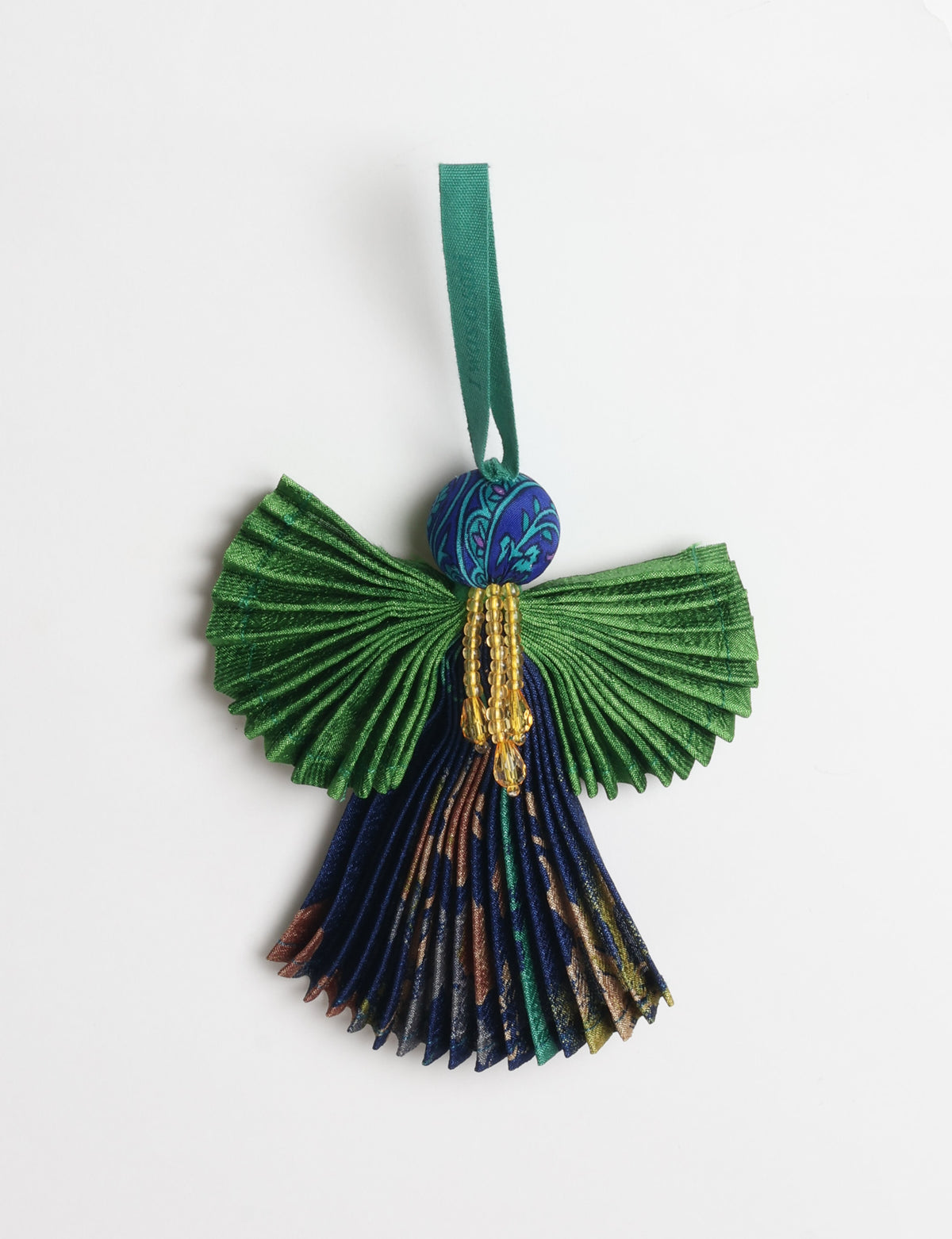 Angel Christmas Ornament made from upcycled saris, featuring pleated arms and body. A sustainable, eco-friendly holiday decoration, embodying recycled fashion and upcycling in festive style.