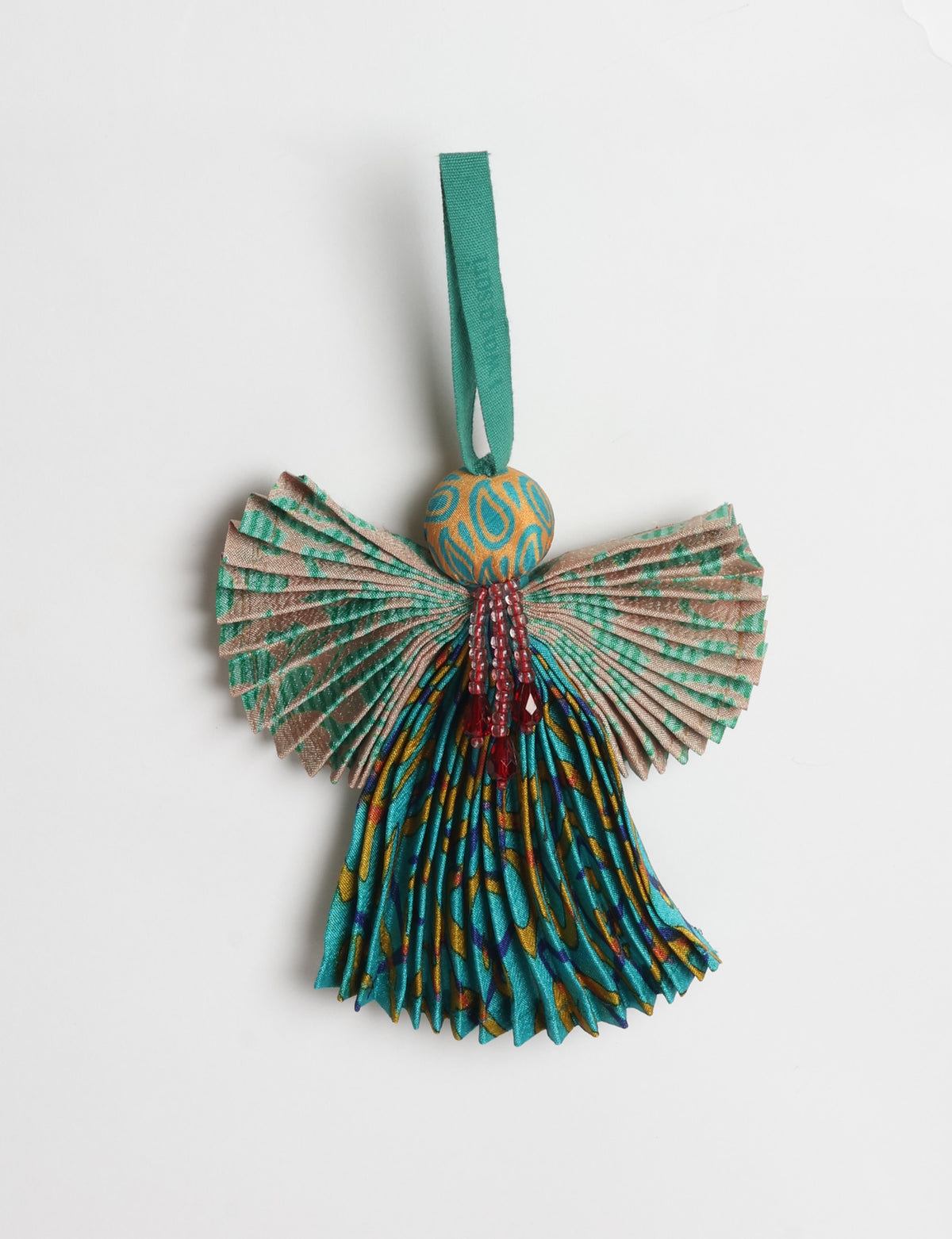 Angel Christmas Ornament made from upcycled saris, featuring pleated arms and body. A sustainable, eco-friendly holiday decoration, embodying recycled fashion and upcycling in festive style.