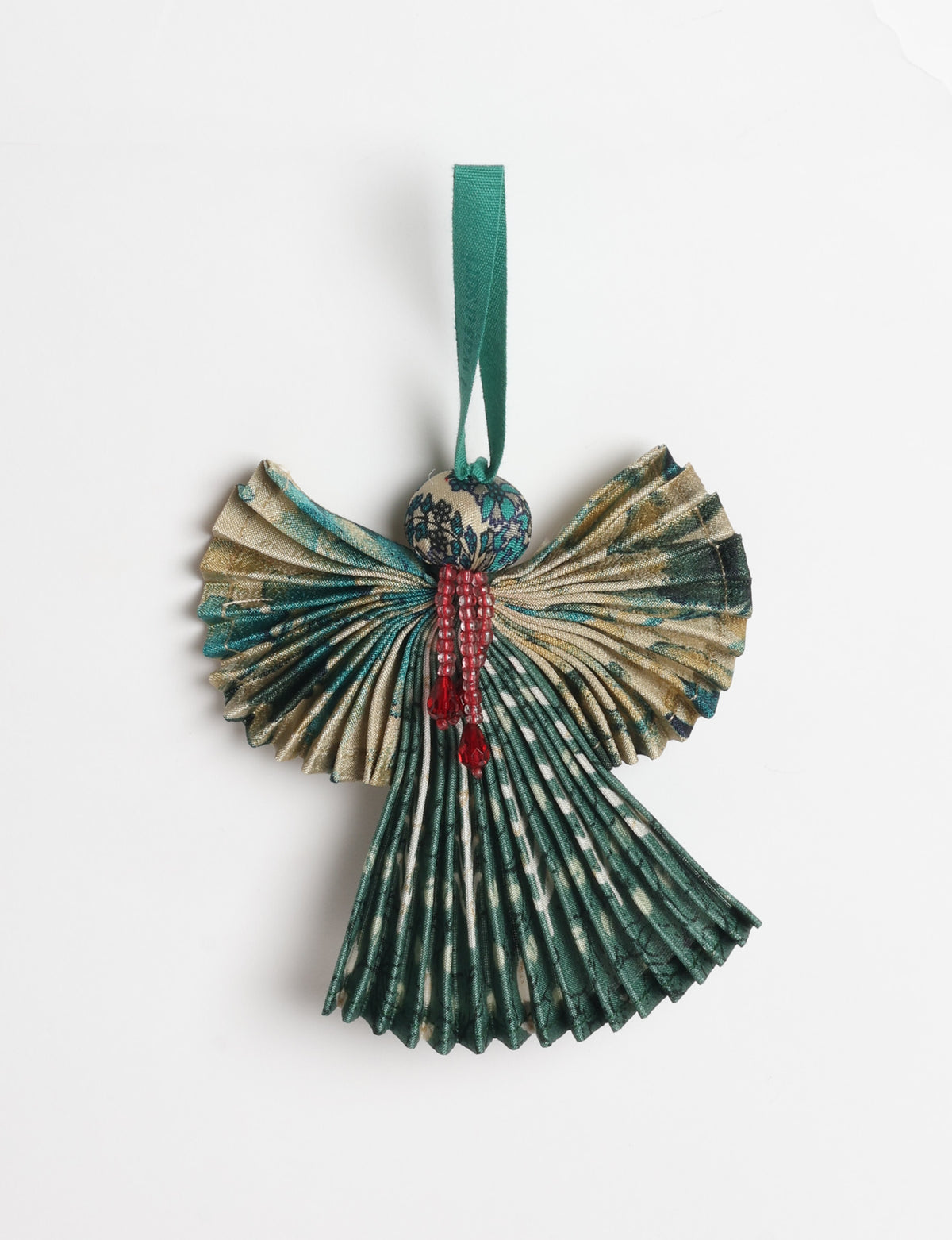 Angel Christmas Ornament made from upcycled saris, featuring pleated arms and body. A sustainable, eco-friendly holiday decoration, embodying recycled fashion and upcycling in festive style.