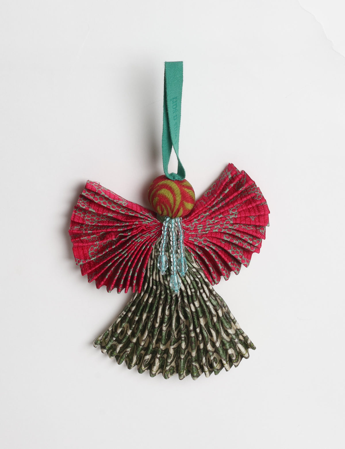 Angel Christmas Ornament made from upcycled saris, featuring pleated arms and body. A sustainable, eco-friendly holiday decoration, embodying recycled fashion and upcycling in festive style.