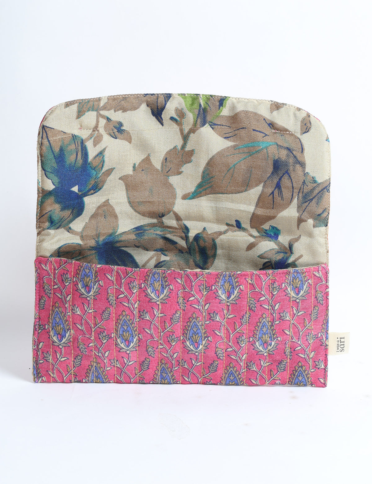 Quilted sunglasses case with pink floral exterior and beige interior featuring blue and brown tropical leaf print, flat lay