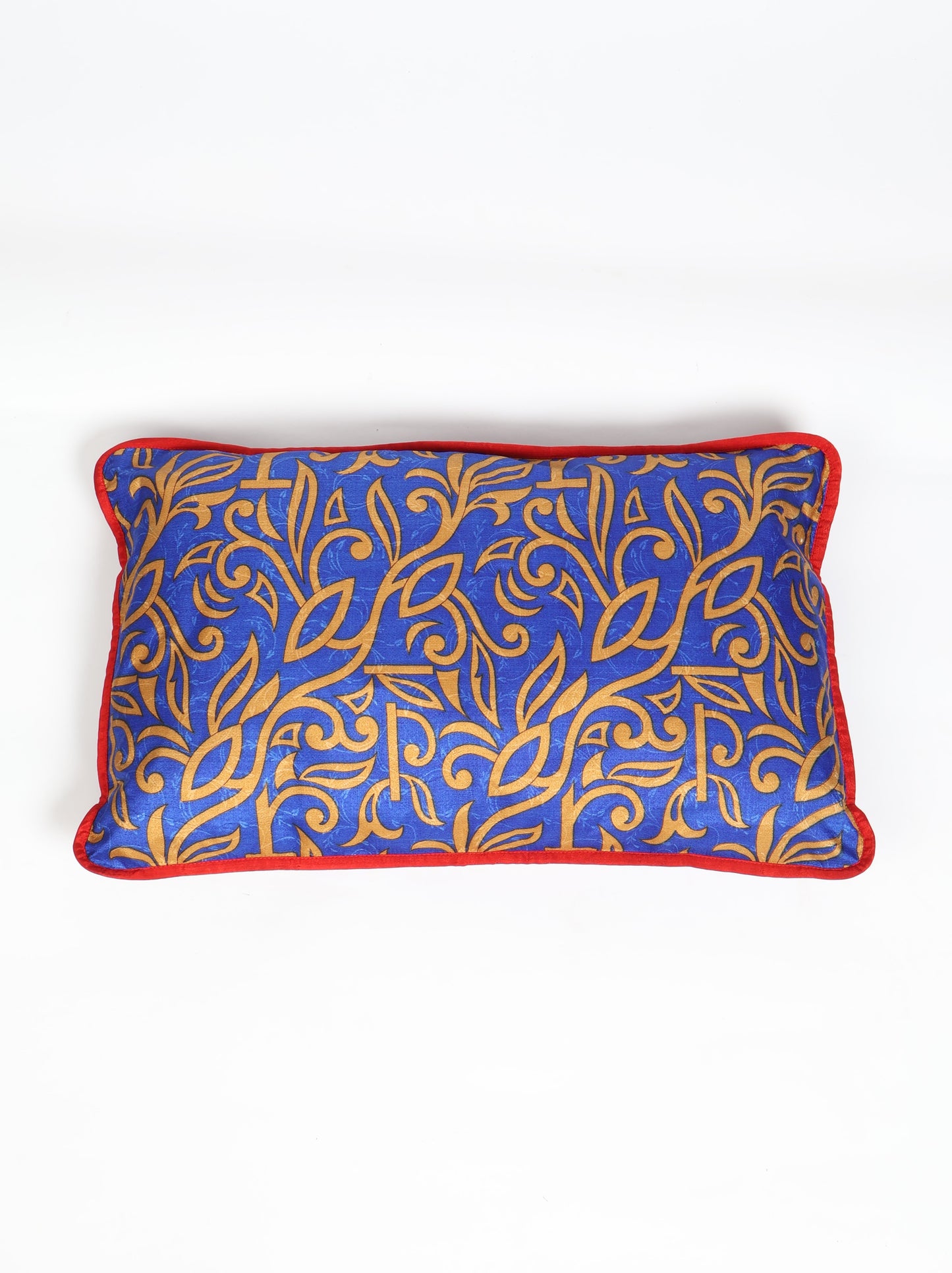 An eco-friendly Lumbar Cushion Cover with piping edge made from recycled saris. Featuring a stylish five-button closure, this sustainable fashion piece highlights upcycled women's clothing, eco-friendly cloth, carbon-neutral fashion, and natural clothing. A beautiful recycled sari product promoting climate-neutral and environmentally friendly clothing.