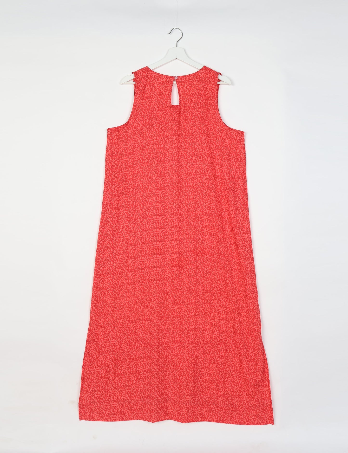 Sleeveless A-Line maxi dress made from recycled saris, showcasing eco clothing and green fashion. A chic example of upcycled women's clothing and climate neutral clothing, perfect for fans of circular fashion, carbon neutral fashion, and products made from textile waste.