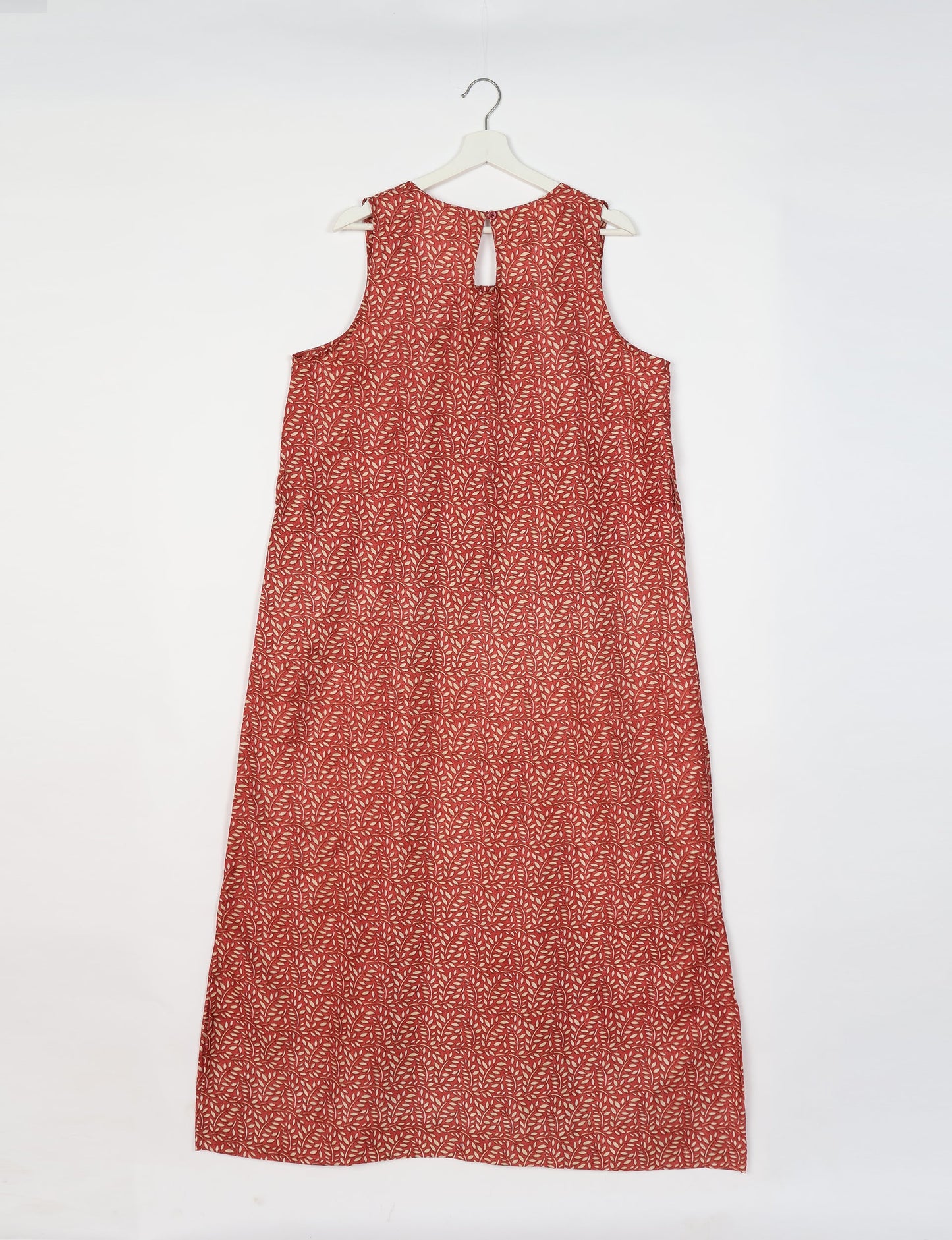 Sleeveless A-Line maxi dress made from recycled saris, showcasing eco clothing and green fashion. A chic example of upcycled women's clothing and climate neutral clothing, perfect for fans of circular fashion, carbon neutral fashion, and products made from textile waste.