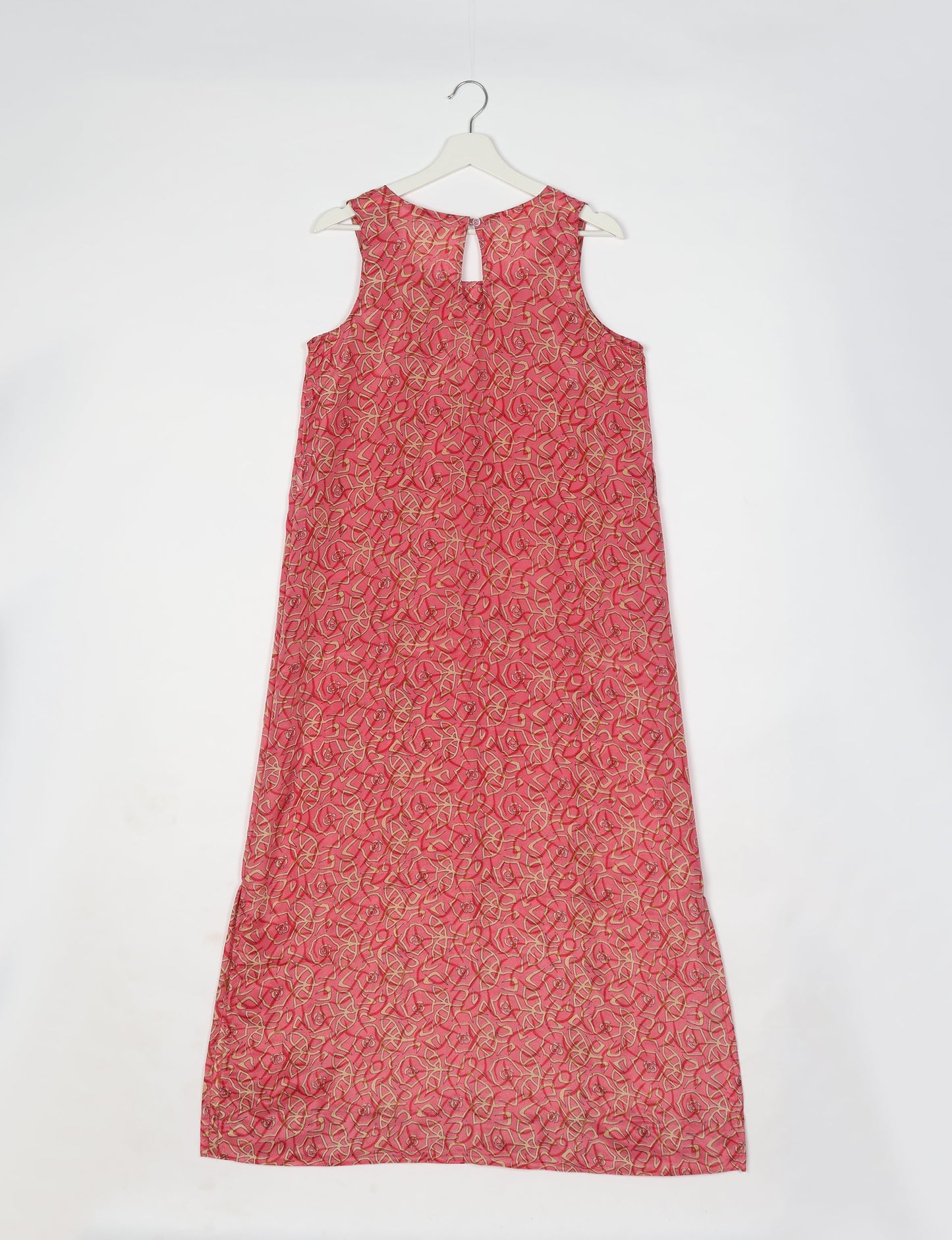 Sleeveless A-Line maxi dress made from recycled saris, showcasing eco clothing and green fashion. A chic example of upcycled women's clothing and climate neutral clothing, perfect for fans of circular fashion, carbon neutral fashion, and products made from textile waste.