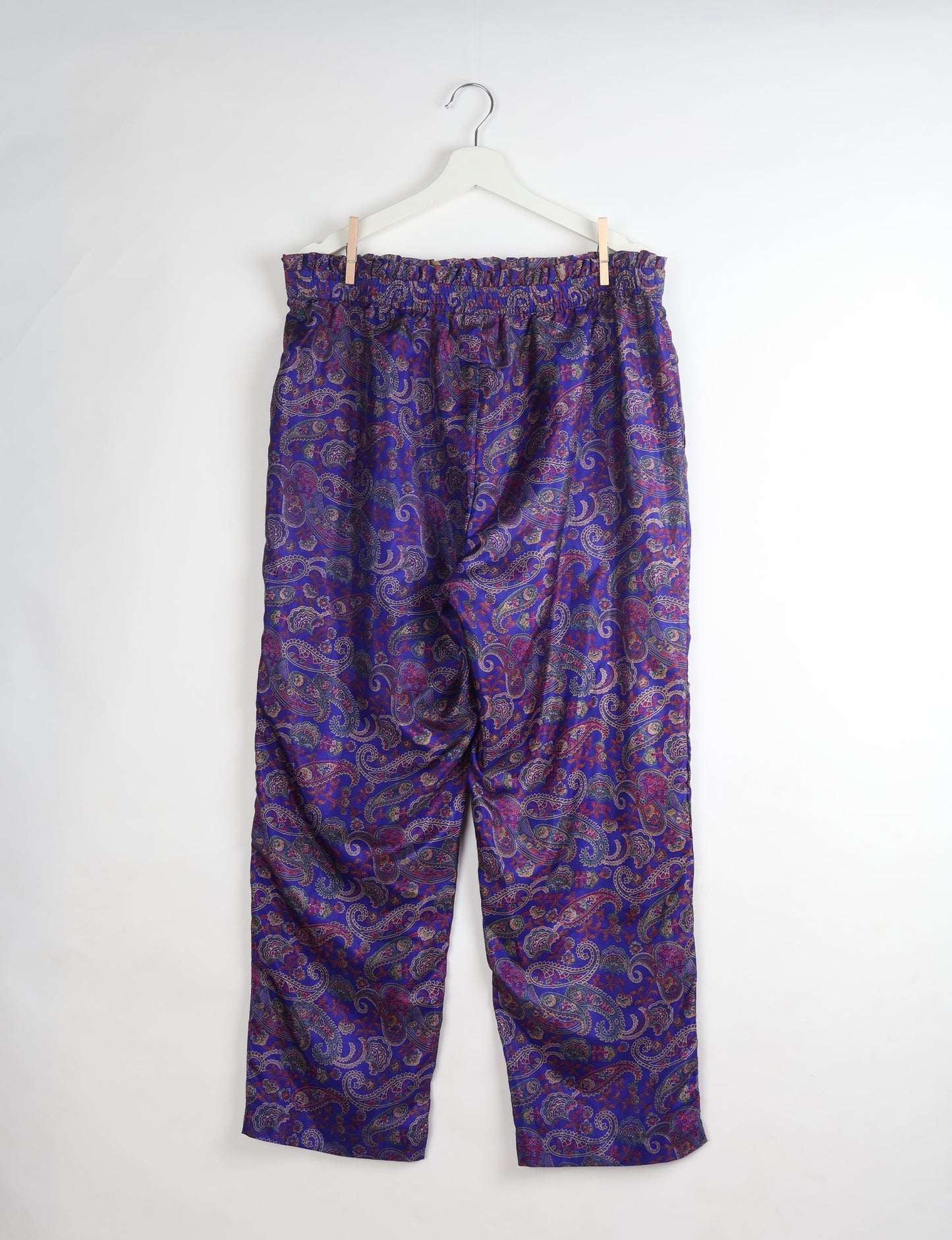 Paperbag high waisted pull-on pants for women made from upcycled garments and recycled fabric, featuring eco clothing design with an elasticated waistband and side pockets. A beautiful example of sustainable women’s clothing and environmentally friendly clothing inspired by upcycling fashion and green fashion movements.