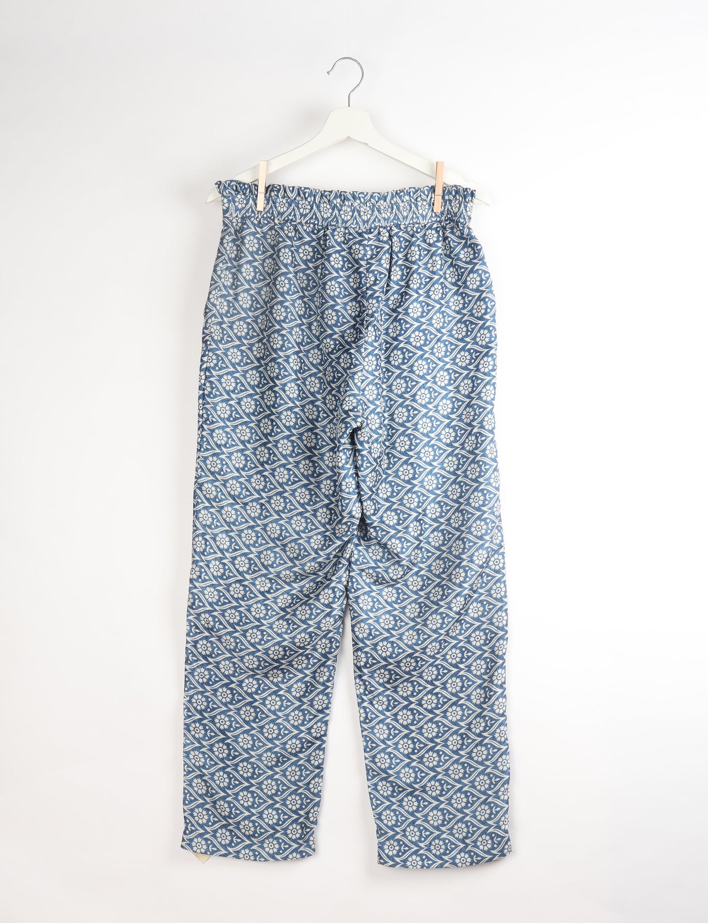 Paperbag high waisted pull-on pants for women made from upcycled garments and recycled fabric, featuring eco clothing design with an elasticated waistband and side pockets. A beautiful example of sustainable women’s clothing and environmentally friendly clothing inspired by upcycling fashion and green fashion movements.