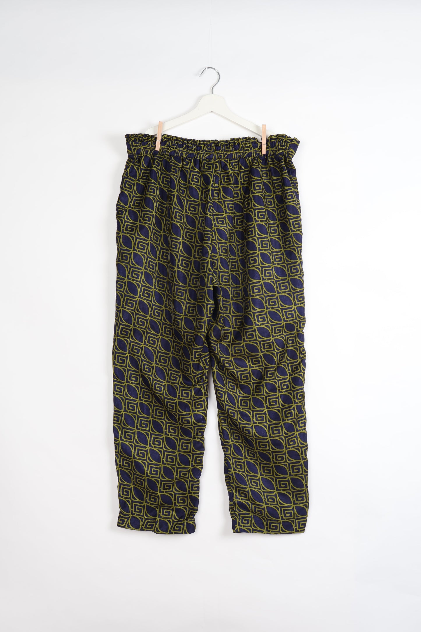 Paperbag high waisted pull-on pants for women made from upcycled garments and recycled fabric, featuring eco clothing design with an elasticated waistband and side pockets. A beautiful example of sustainable women’s clothing and environmentally friendly clothing inspired by upcycling fashion and green fashion movements.