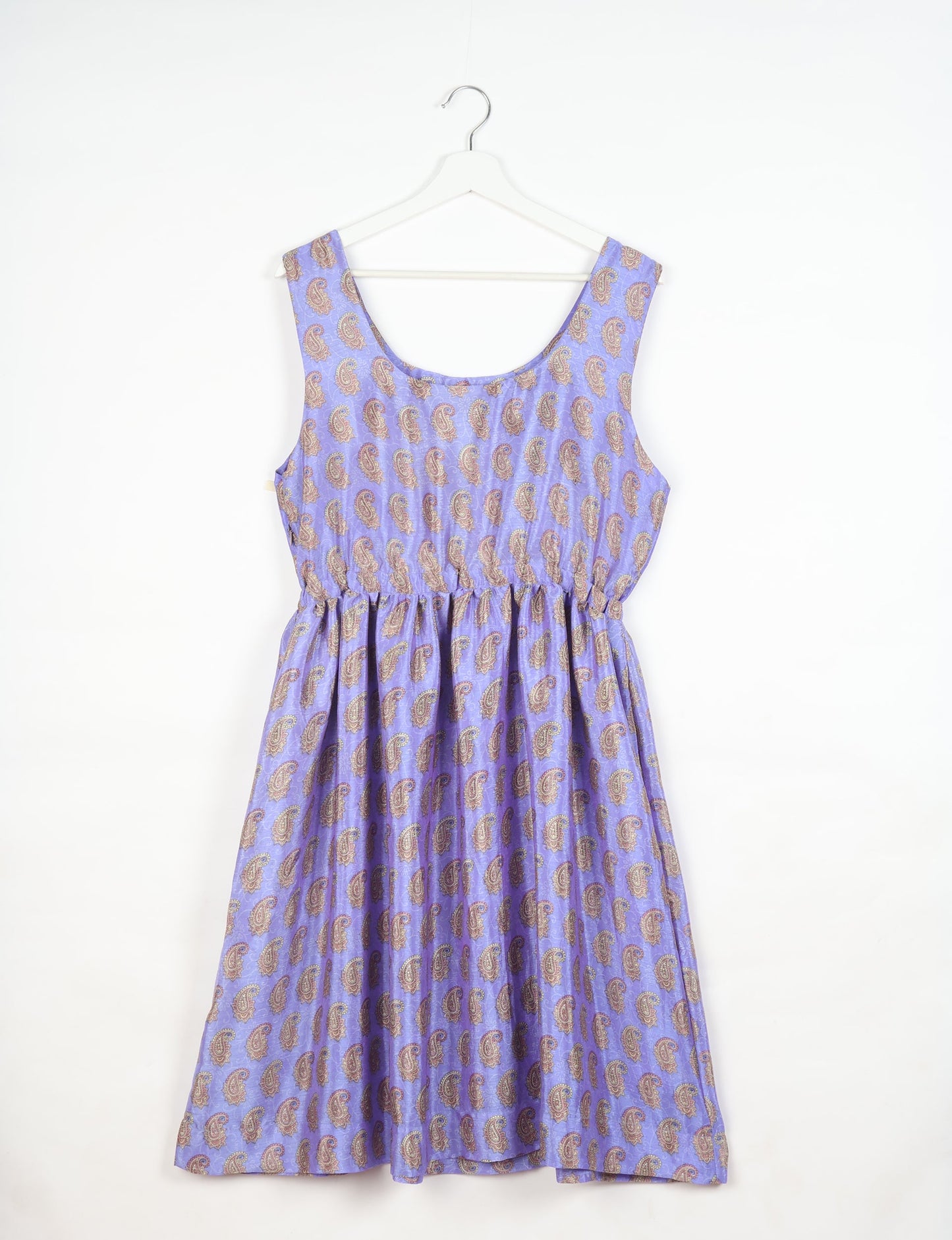 Upcycled women’s fit and flare dress made from recycled sari products, showcasing environment friendly clothing and green fashion design — an eco clothing choice for conscious clothing lovers and sustainable women’s fashion enthusiasts.