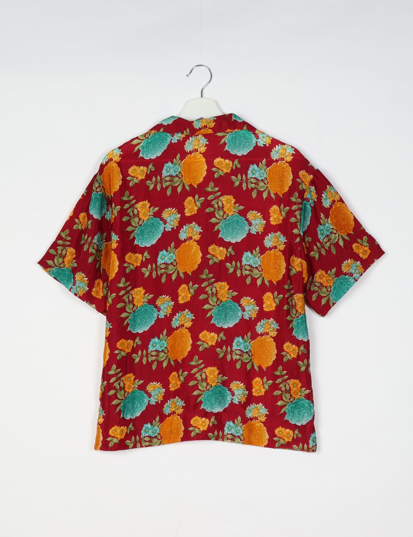 Oversized shirt made from recycled sari fabric, reflecting eco friendly fashion, repurposed clothing, and earth friendly clothing for conscious wardrobes.