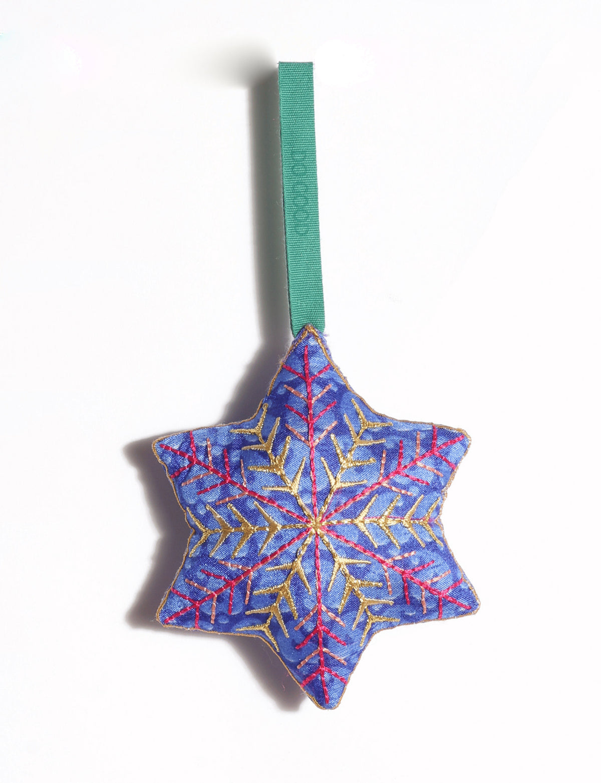 Handcrafted snowflake Christmas ornament made from preloved saris with silk and metallic gold thread embroidery