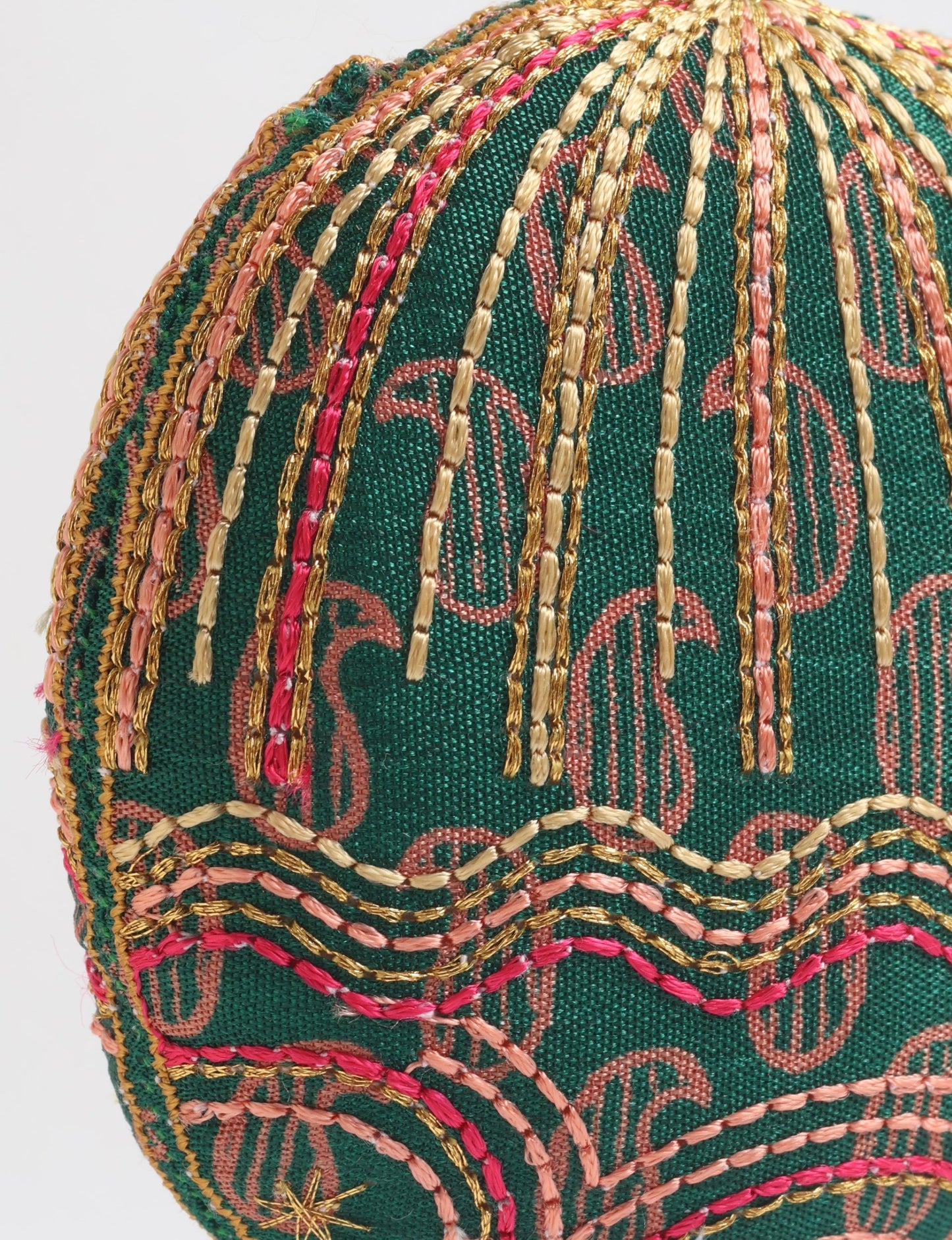 Timeless Full Moon ornament handmade from recycled sari fabric, featuring organic cotton filling and gold thread embroidery — a beautiful piece of upcycled clothing, eco clothing, and sustainable women’s fashion made from repurposed materials.