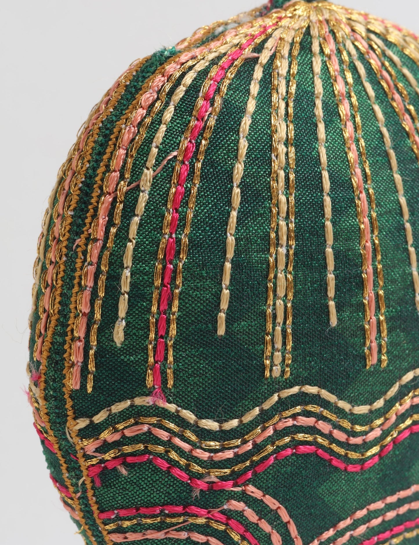 Timeless Full Moon ornament handmade from recycled sari fabric, featuring organic cotton filling and gold thread embroidery — a beautiful piece of upcycled clothing, eco clothing, and sustainable women’s fashion made from repurposed materials.