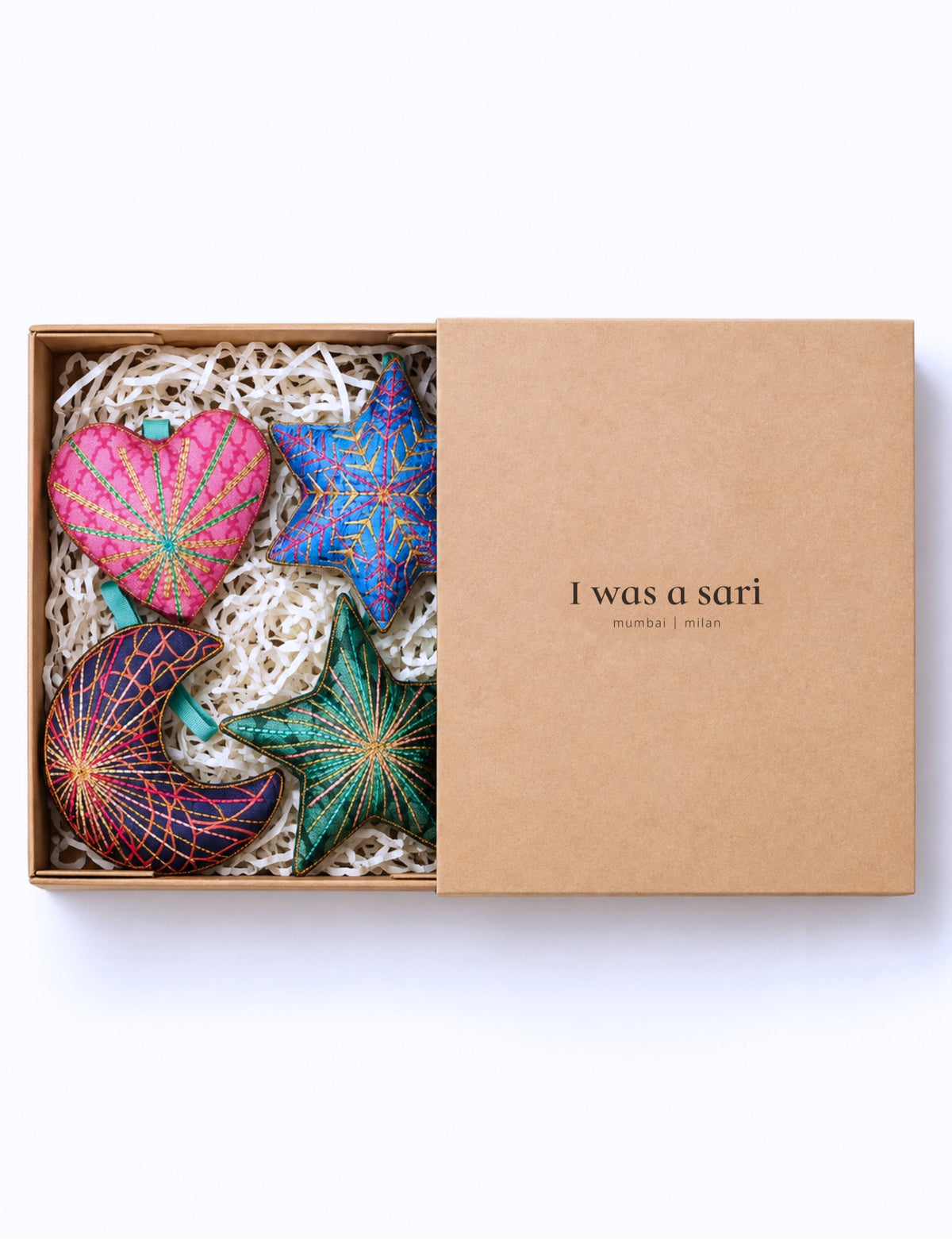 Handcrafted Christmas ornament gift box set with four upcycled sari ornaments in heart, star, snowflake and crescent moon shapes, embroidered with silk and gold threads.