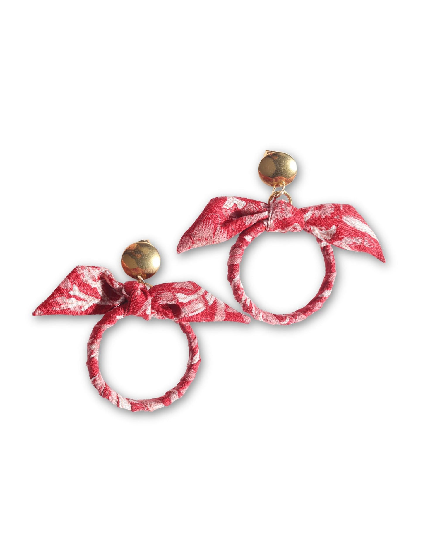 Drop earrings with bow detail and circular ring inspired by upcycled women’s clothing, sustainable women’s clothing, eco friendly clothes, recycled sustainable fashion, carbon neutral clothing, and environment friendly clothing values.