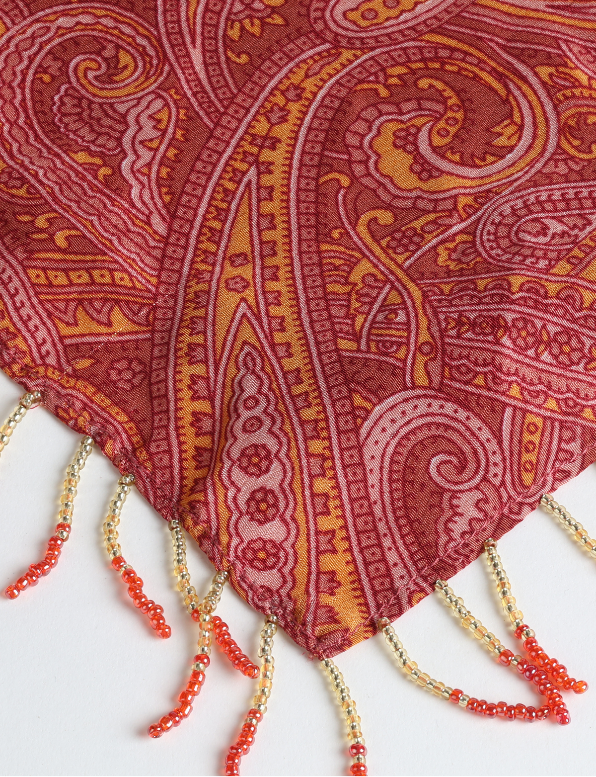 Square lightweight neck scarf with delicate beaded fringes along the edges and neatly stitched finishing, designed for versatile styling.