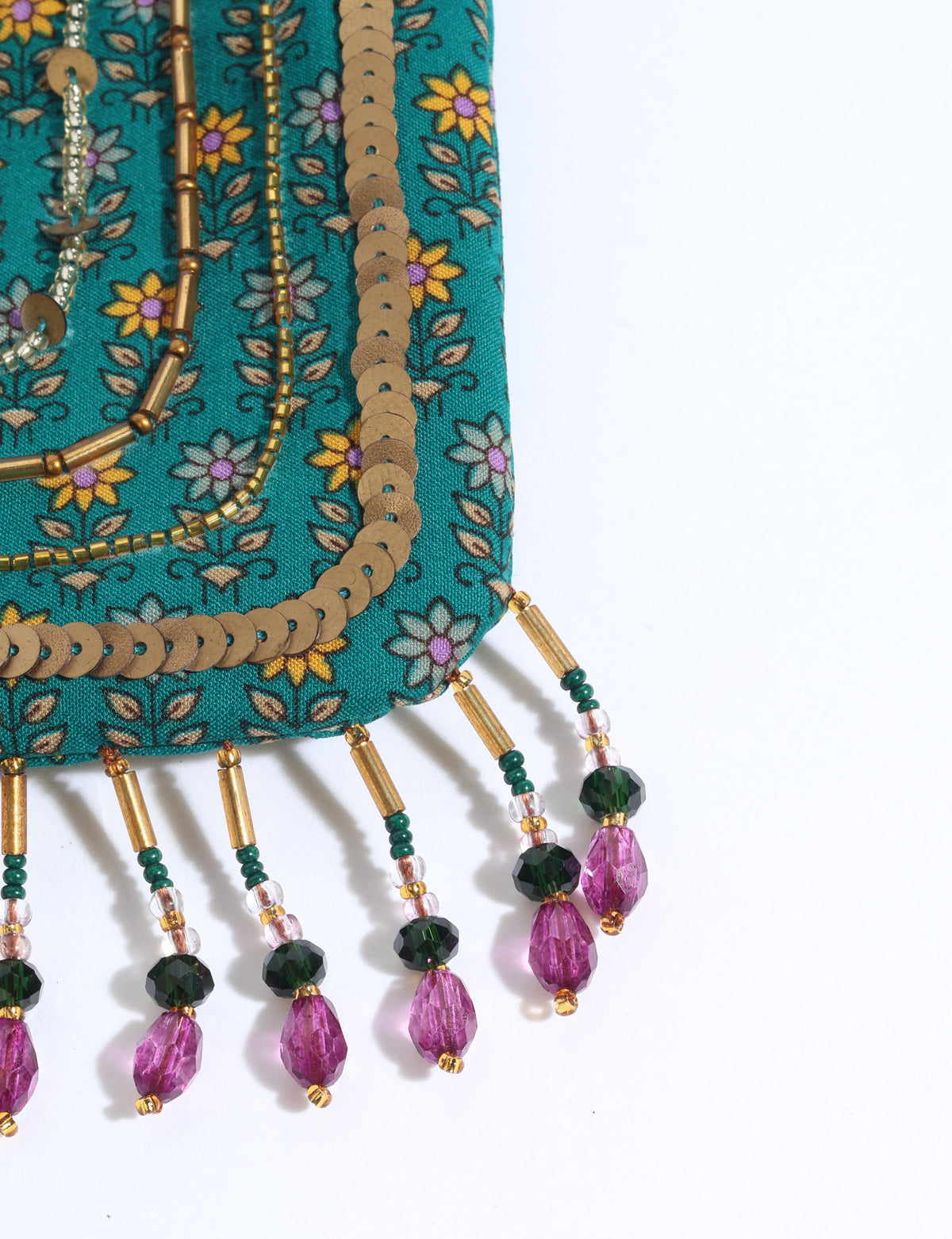Embroidered DO GOOD potli bag made from upcycled sari fabric with tassel closure and detachable metal chain strap.