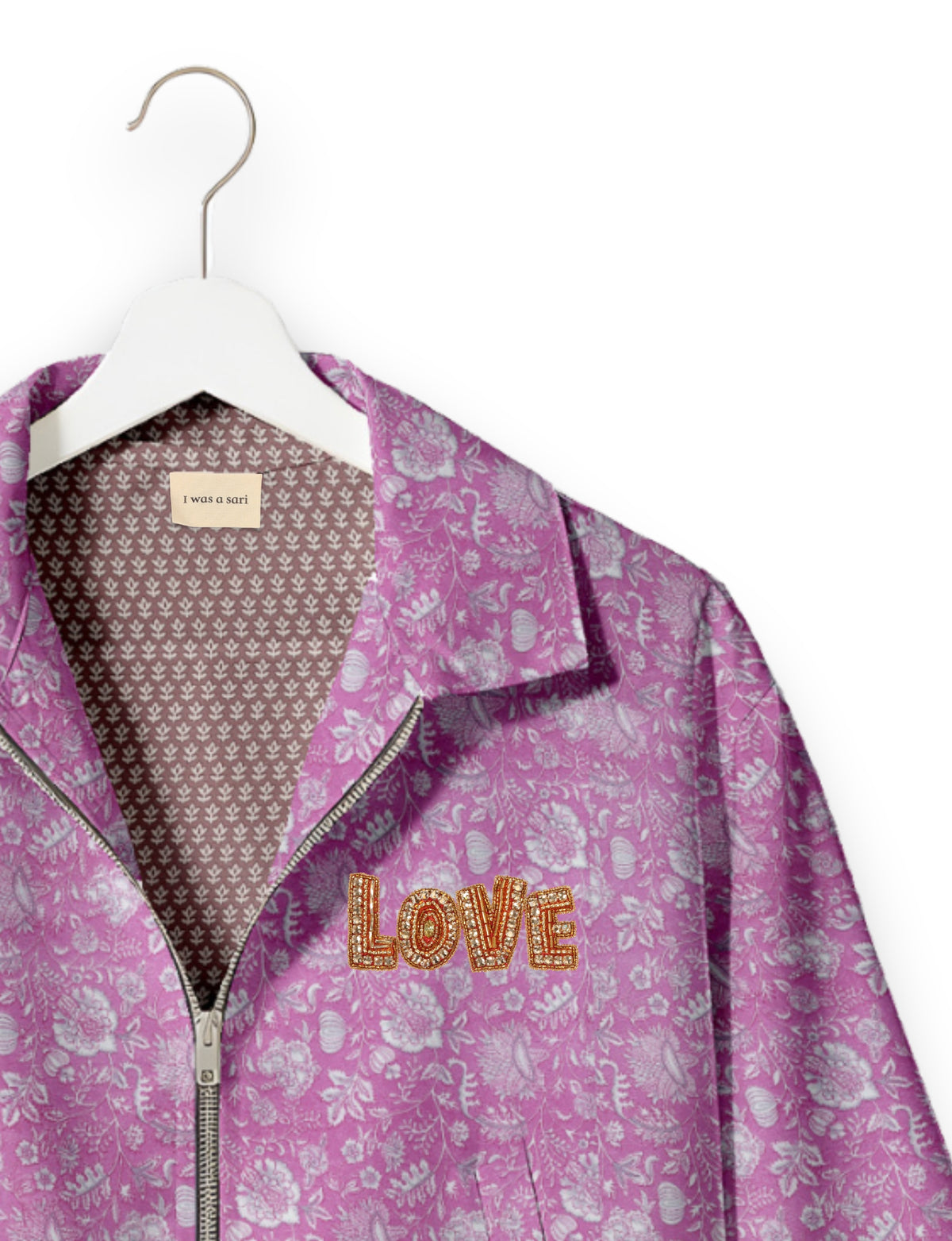 Love Bomber Jacket made from recycled fabric, featuring hand-stitched Aari embroidery. A unique piece of zero-waste clothing, part of the circular fashion movement. Designed with upcycled materials for a stylish yet environmentally friendly clothing choice.