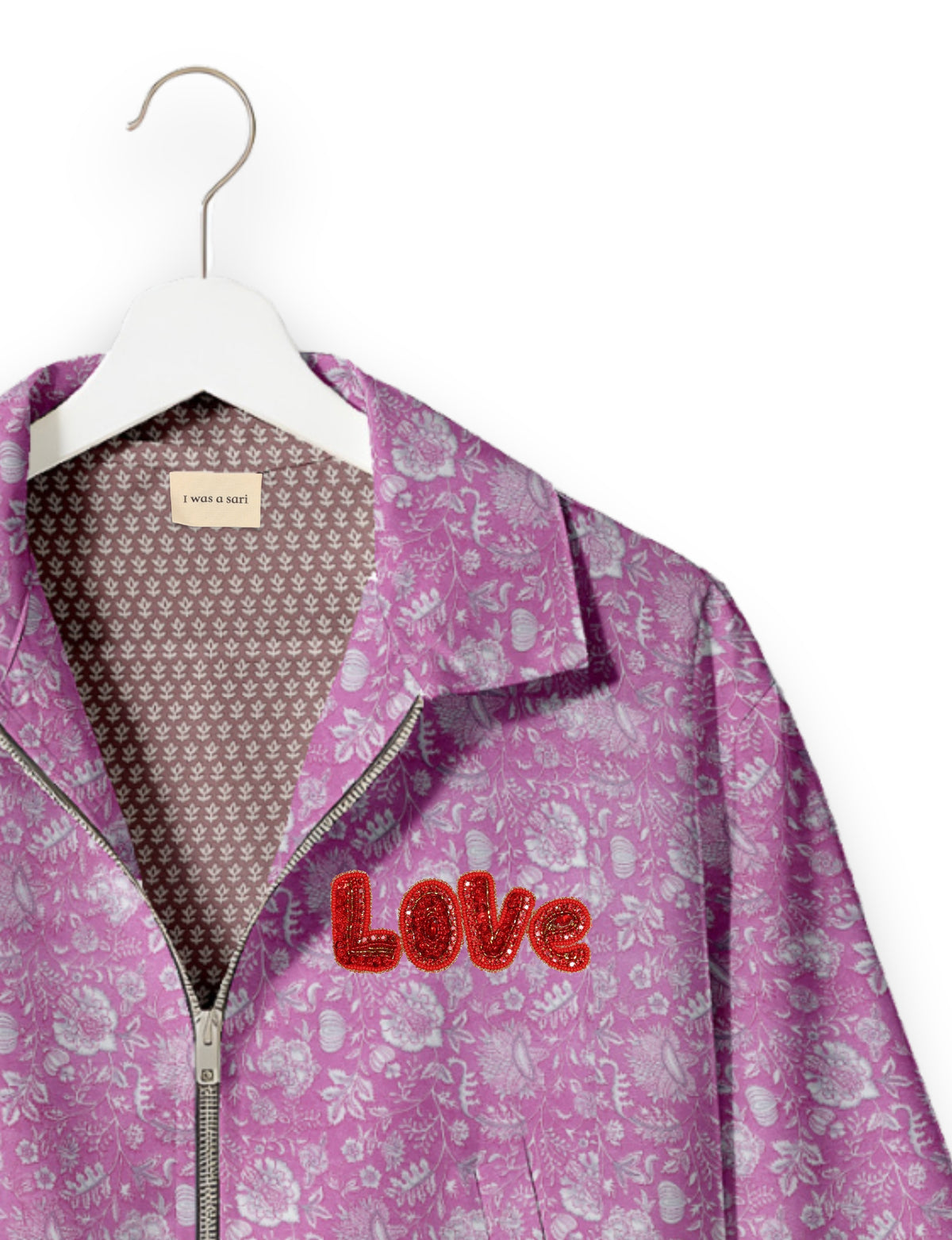 Love Bomber Jacket made from recycled fabric, featuring hand-stitched Aari embroidery. A unique piece of zero-waste clothing, part of the circular fashion movement. Designed with upcycled materials for a stylish yet environmentally friendly clothing choice.