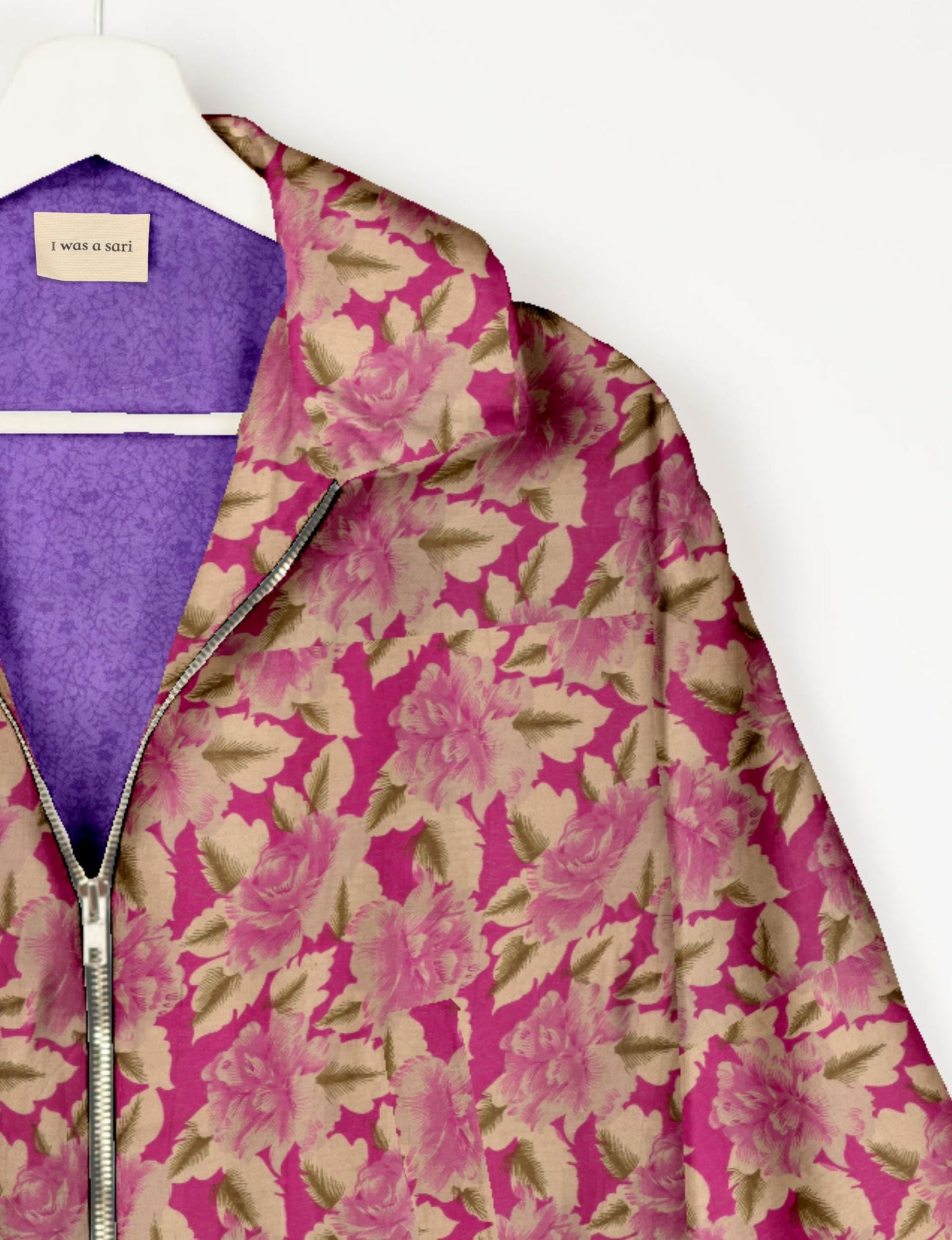 Upcycled Bomber Jacket made from recycled sari materials, featuring a cute cropped shape, elasticated hem and cuffs, and contrast sari print lining. Sustainable apparel promoting eco-friendly fashion and ethical clothing.