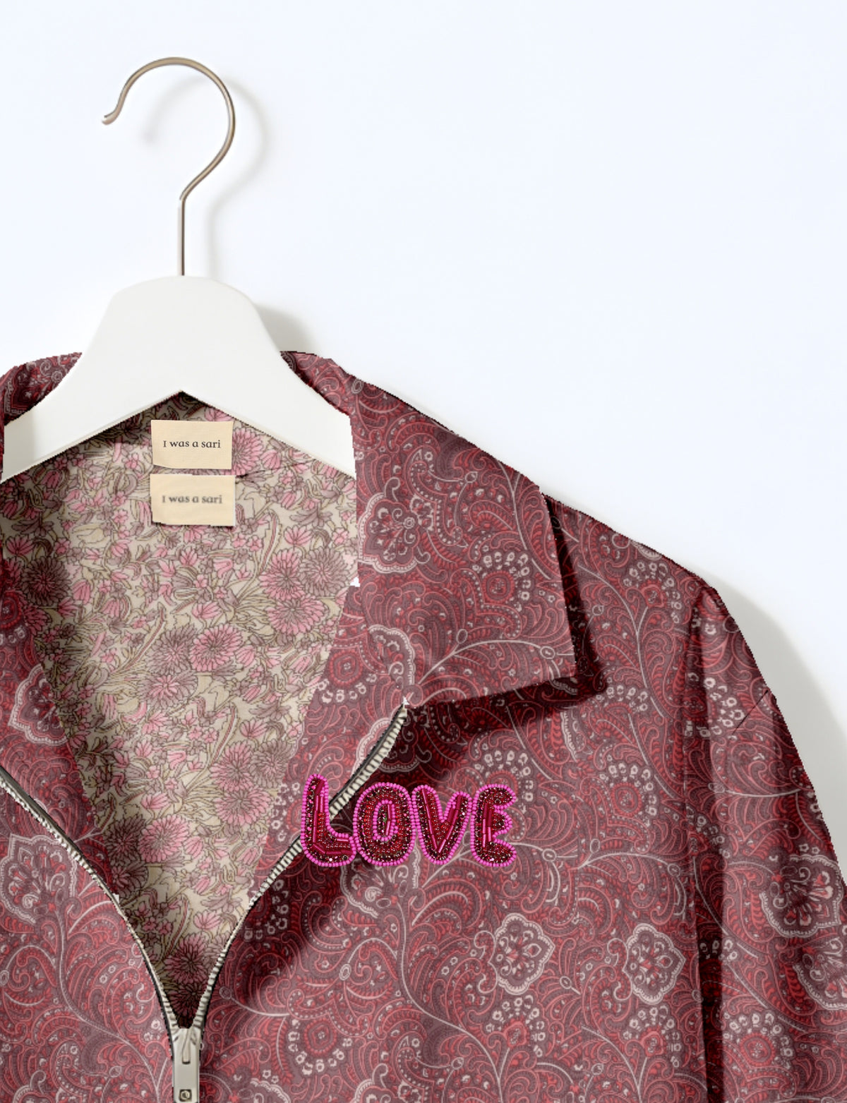 Love Bomber Jacket made from recycled fabric, featuring hand-stitched Aari embroidery. A unique piece of zero-waste clothing, part of the circular fashion movement. Designed with upcycled materials for a stylish yet environmentally friendly clothing choice.