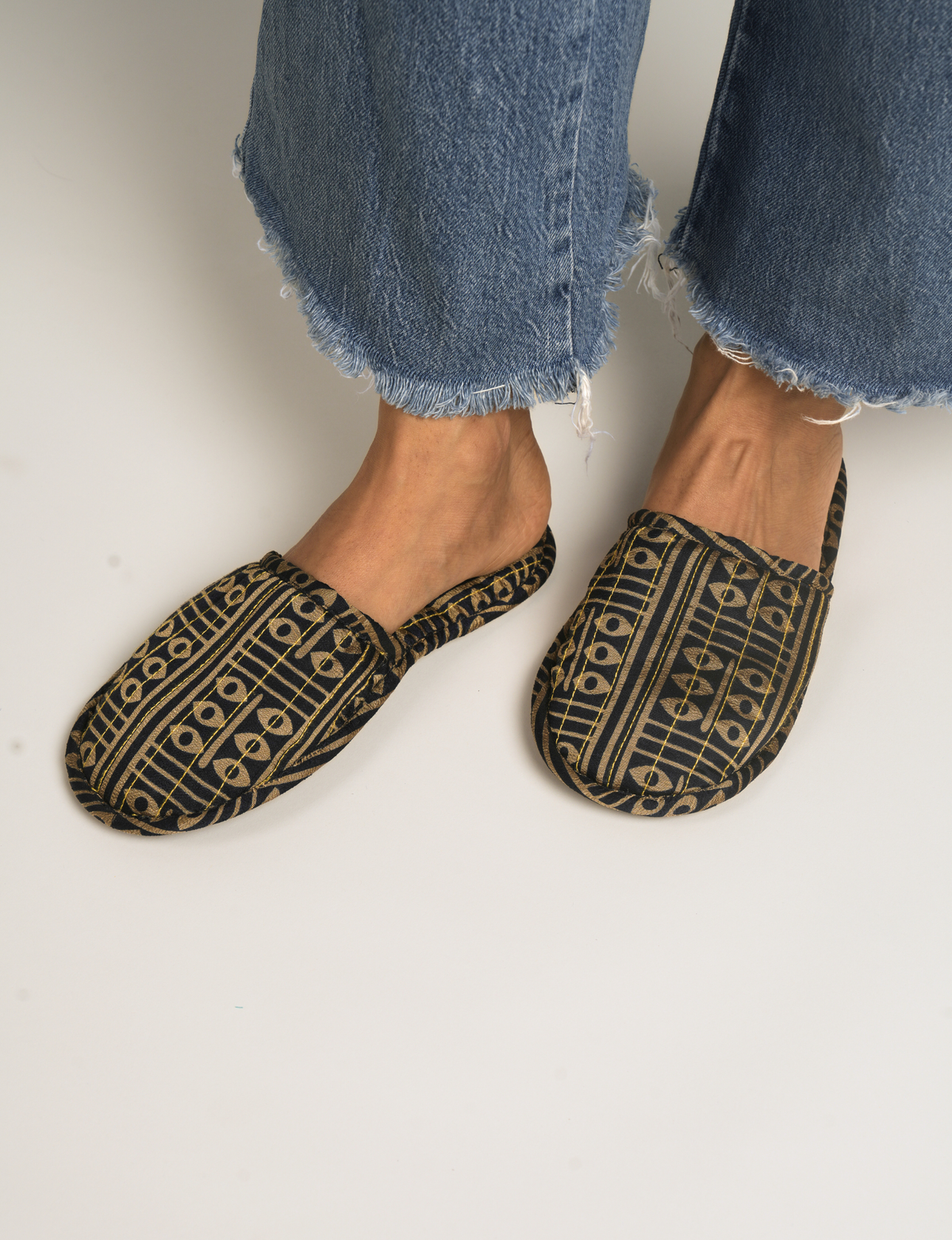 Elevate your downtime with our Quilted Slippers. Ethical, sustainable, and crafted by female artisans in Mumbai, these slippers offer cushioned comfort with a touch of chic style. Warm on the inside, fashionable on the outside, step into sustainable luxury.