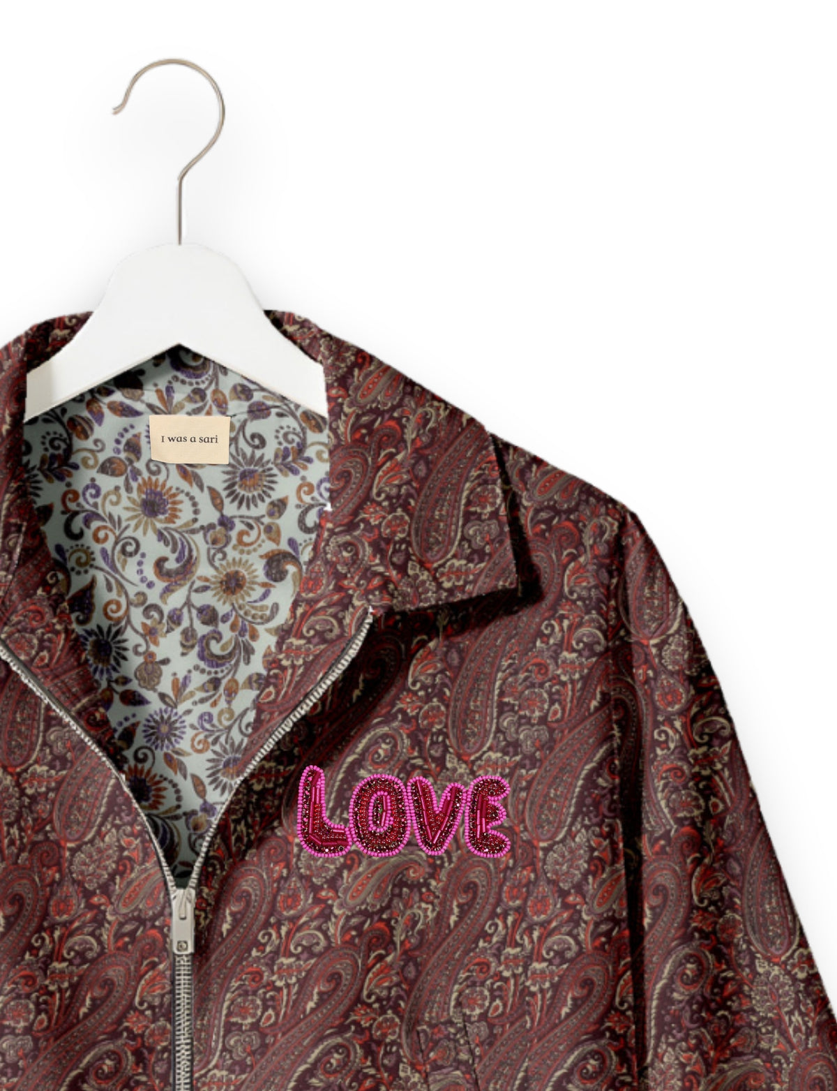 Love Bomber Jacket made from recycled fabric, featuring hand-stitched Aari embroidery. A unique piece of zero-waste clothing, part of the circular fashion movement. Designed with upcycled materials for a stylish yet environmentally friendly clothing choice.